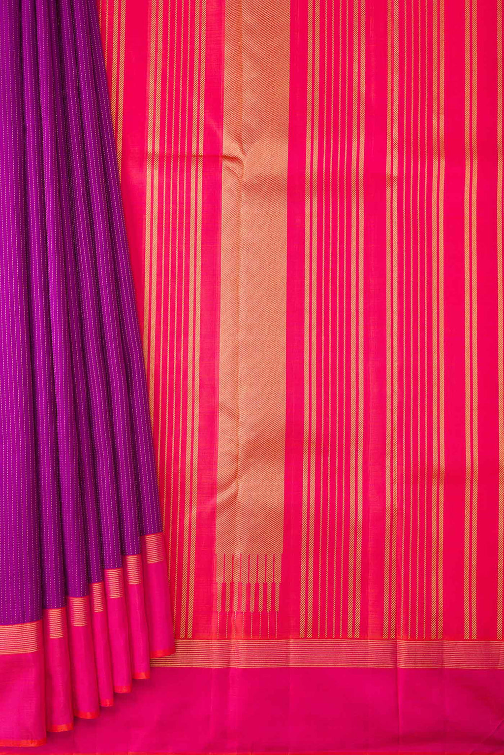 Pleats and pallu of Magenta Dual Tone Kanchipuram Saree with Stripes on the body and Zari Border