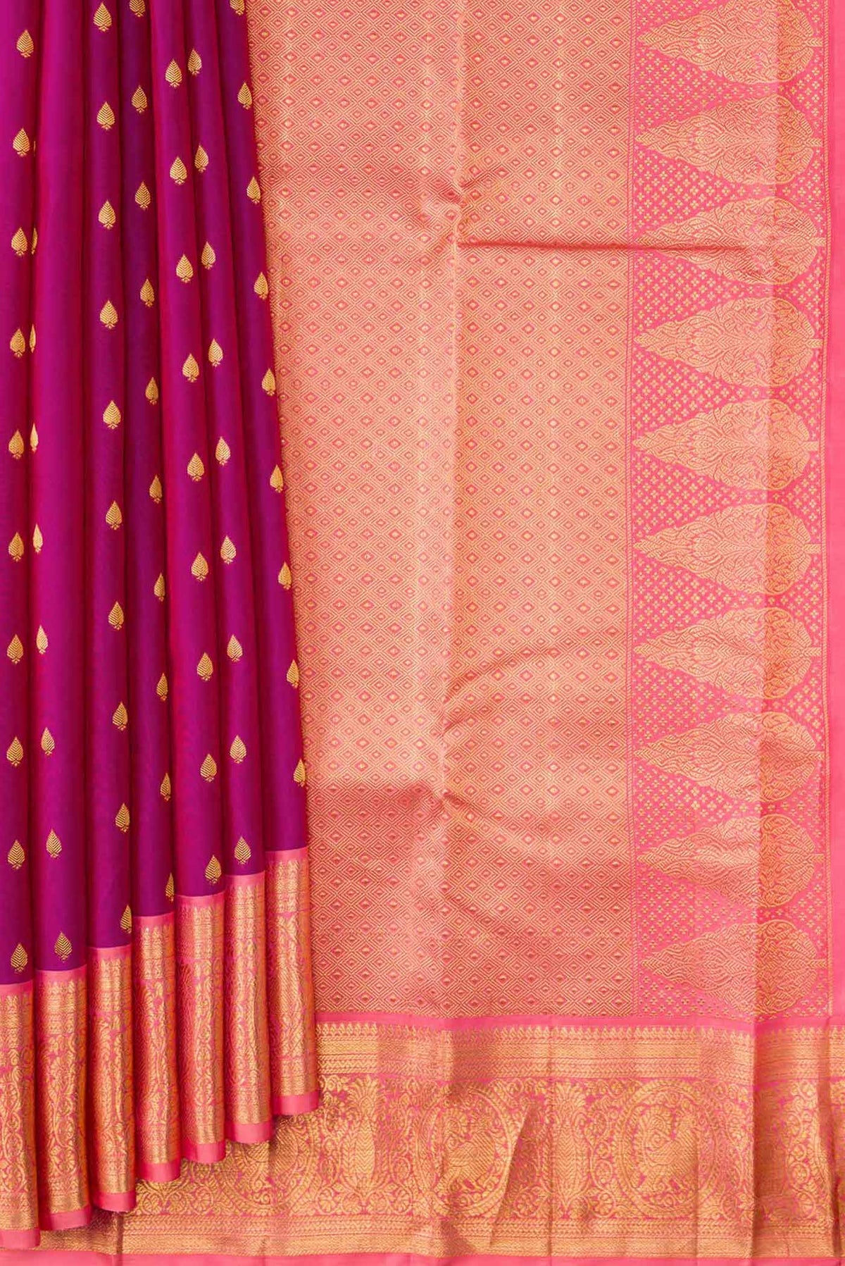 Pleats and pallu of Magenta Dual Tone Kanchipuram Silk Saree with Zari Butta on the body and Zari Border