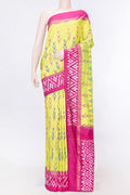 Parrot Green Dual Tone Pochampally Silk Saree with Ikat Print on the body and Ikat Border displayed on a mannequin