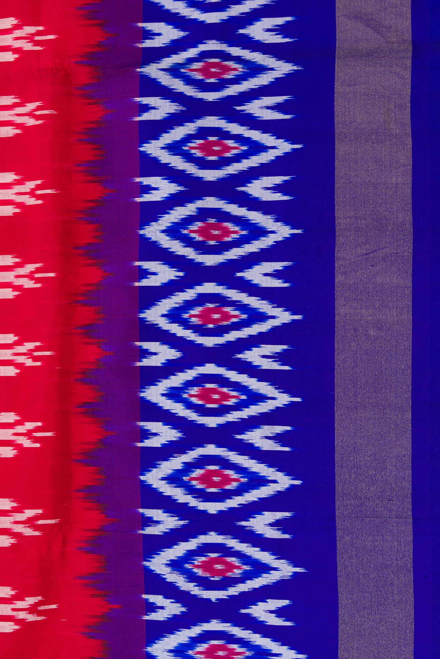 Border image of Red Dual Tone Double Ikat Saree with Ikat Print on the body and Ikat Border. 