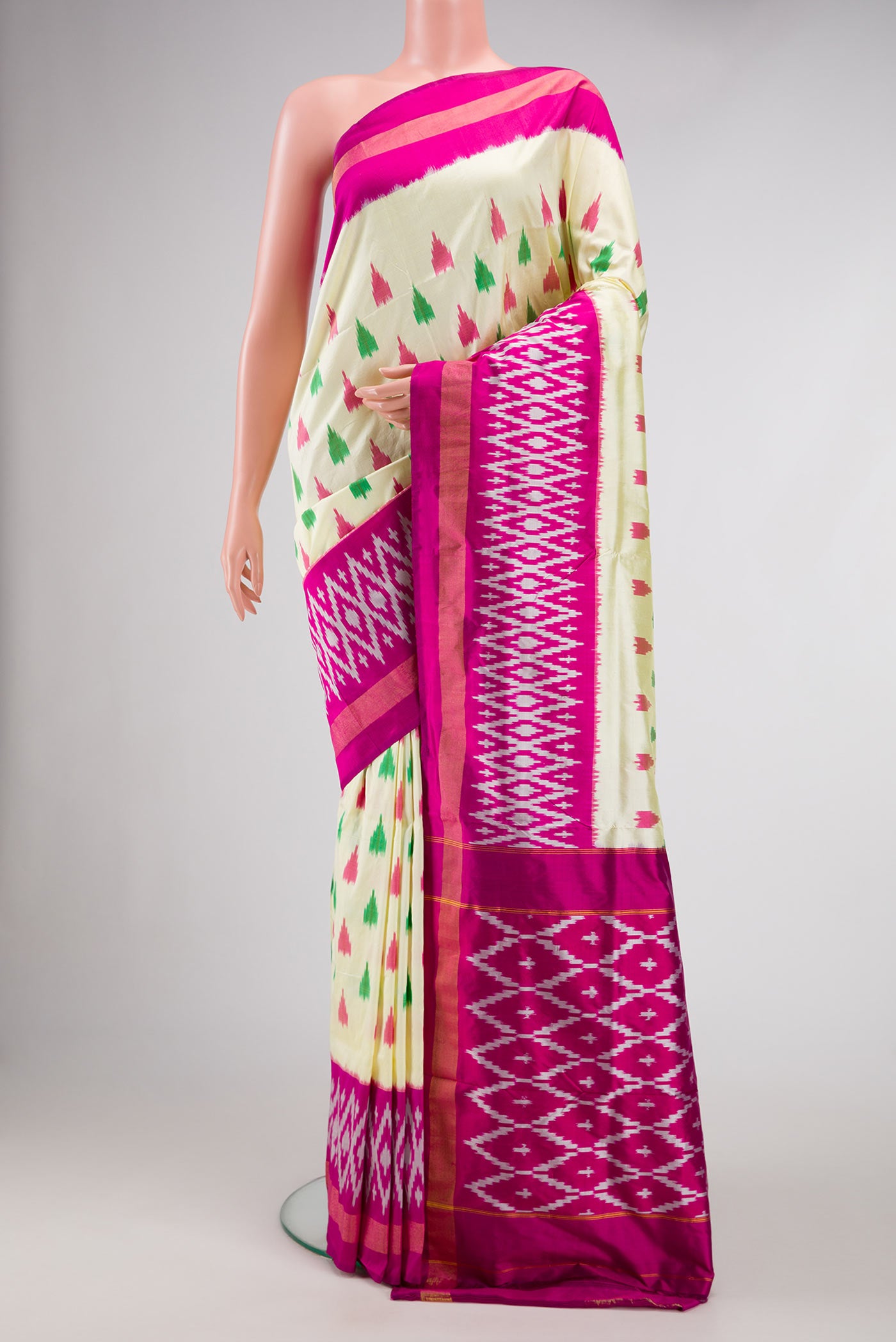 Sandal Dual Tone Double Ikat Saree with Ikat Print on the body and Ikat Border.  displayed on a mannequin