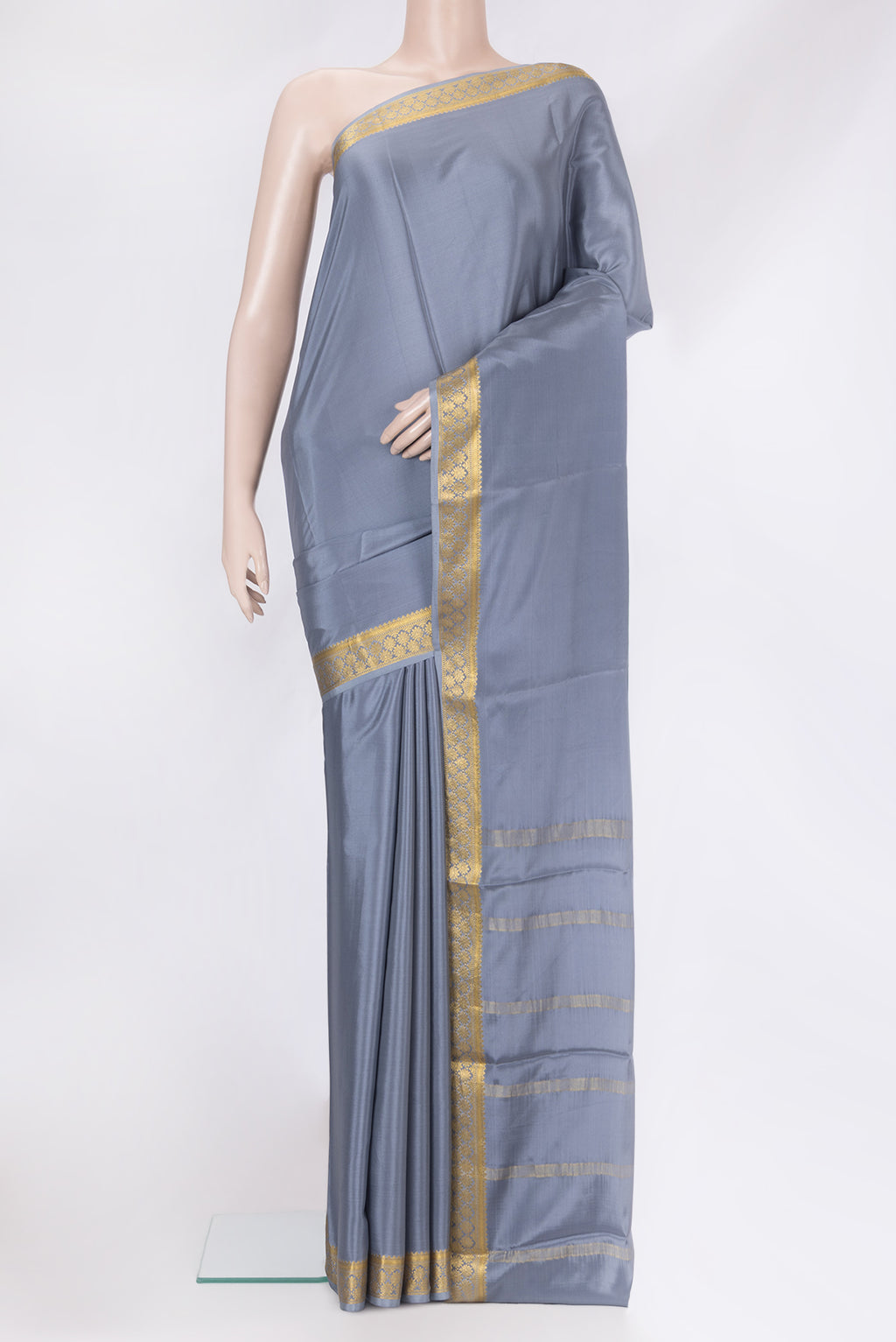 Grey Mysore Silk Saree with Plain Body and Zari Border.  displayed on a mannequin
