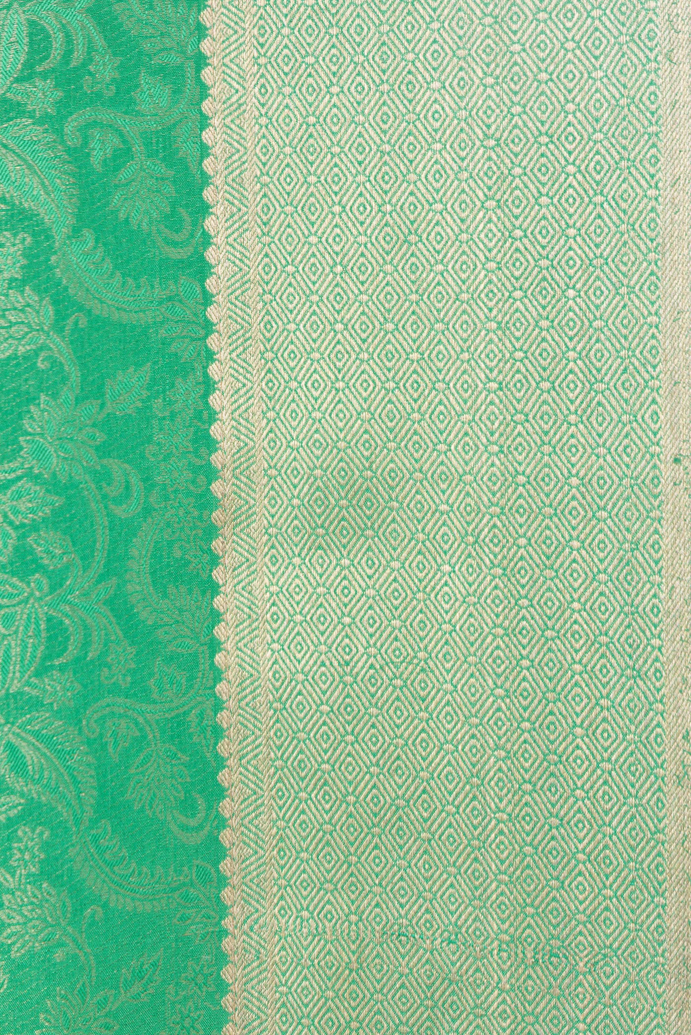 Border image of Sea Green Dual Tone Mysore Silk Saree with Zari Brocade on the body and Zari Border. 
