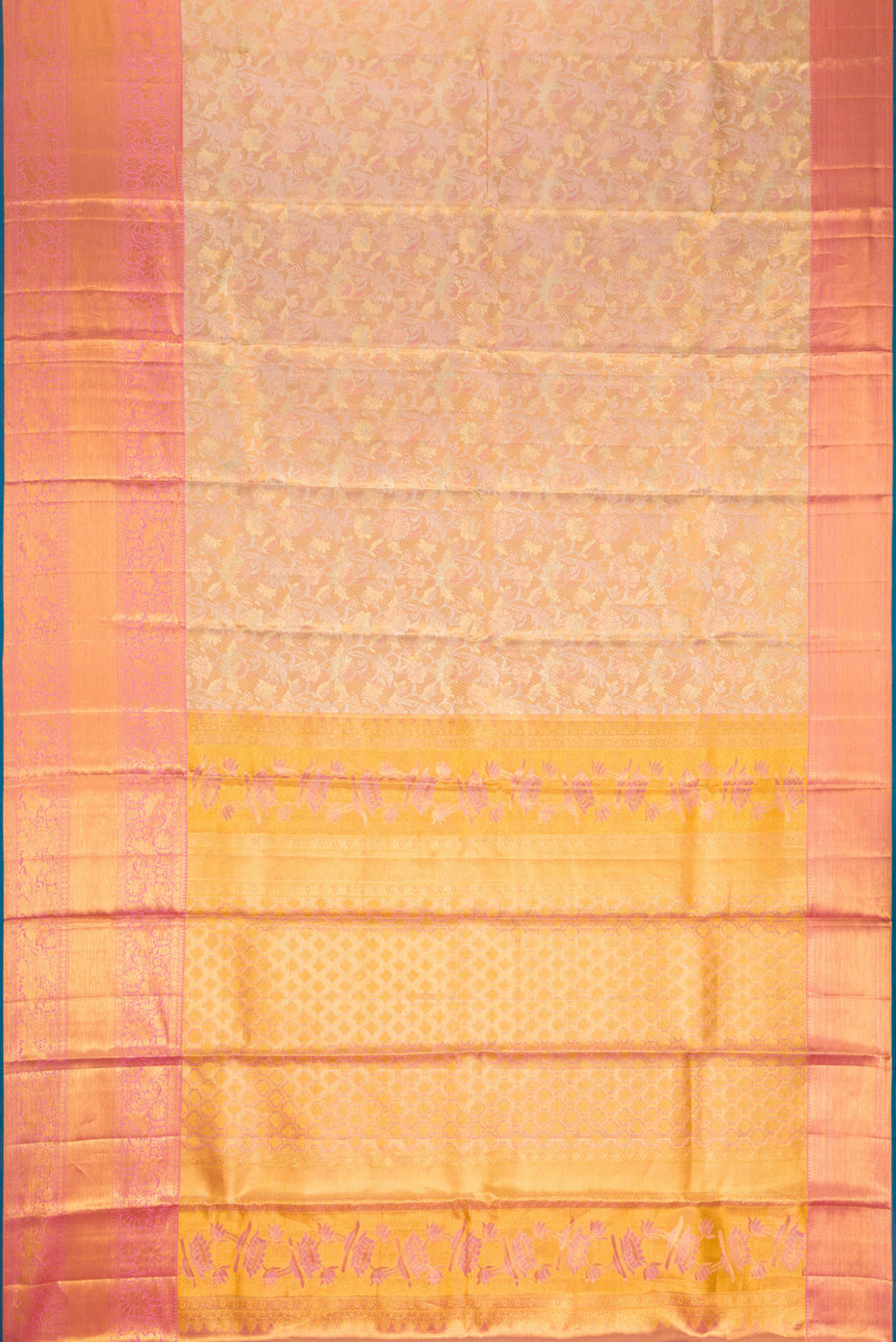 Flat view of Rose Gold Dual Tone Kanchipuram Tissue Silk Saree with Zari Brocade on the body and Zari Border. 