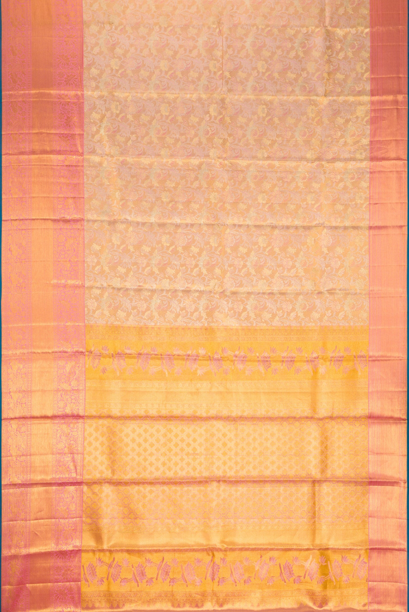 Flat view of Rose Gold Dual Tone Kanchipuram Tissue Silk Saree with Zari Brocade on the body and Zari Border. 