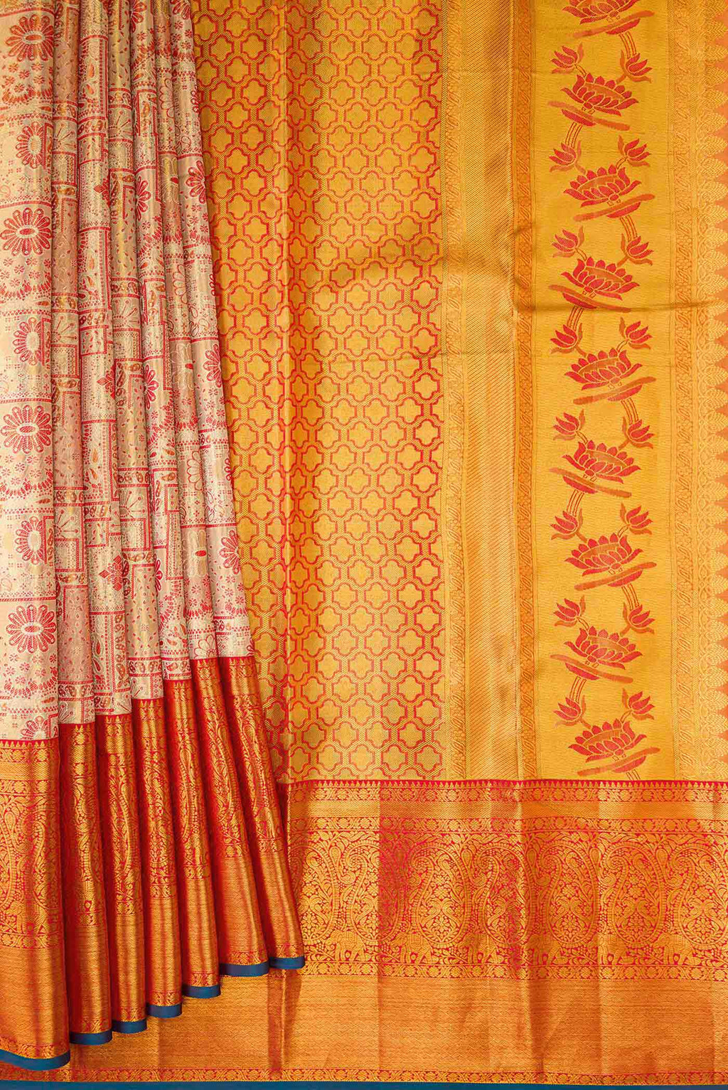 Pleats and pallu of Gold Dual Tone Kanchipuram Tissue Silk Saree with Zari Brocade on the body and Zari Border. 
