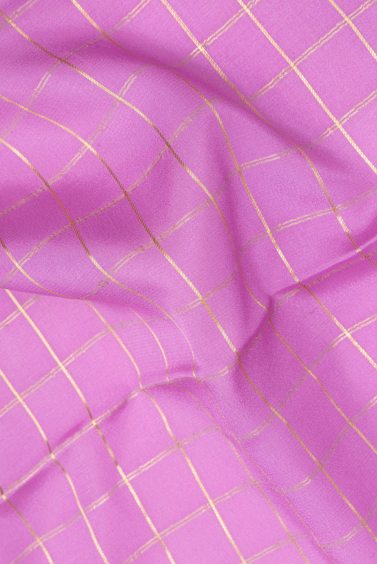 Close up of Lavender Mysore Crepe Saree with Checked design on the body and Zari Border.  displaying folds