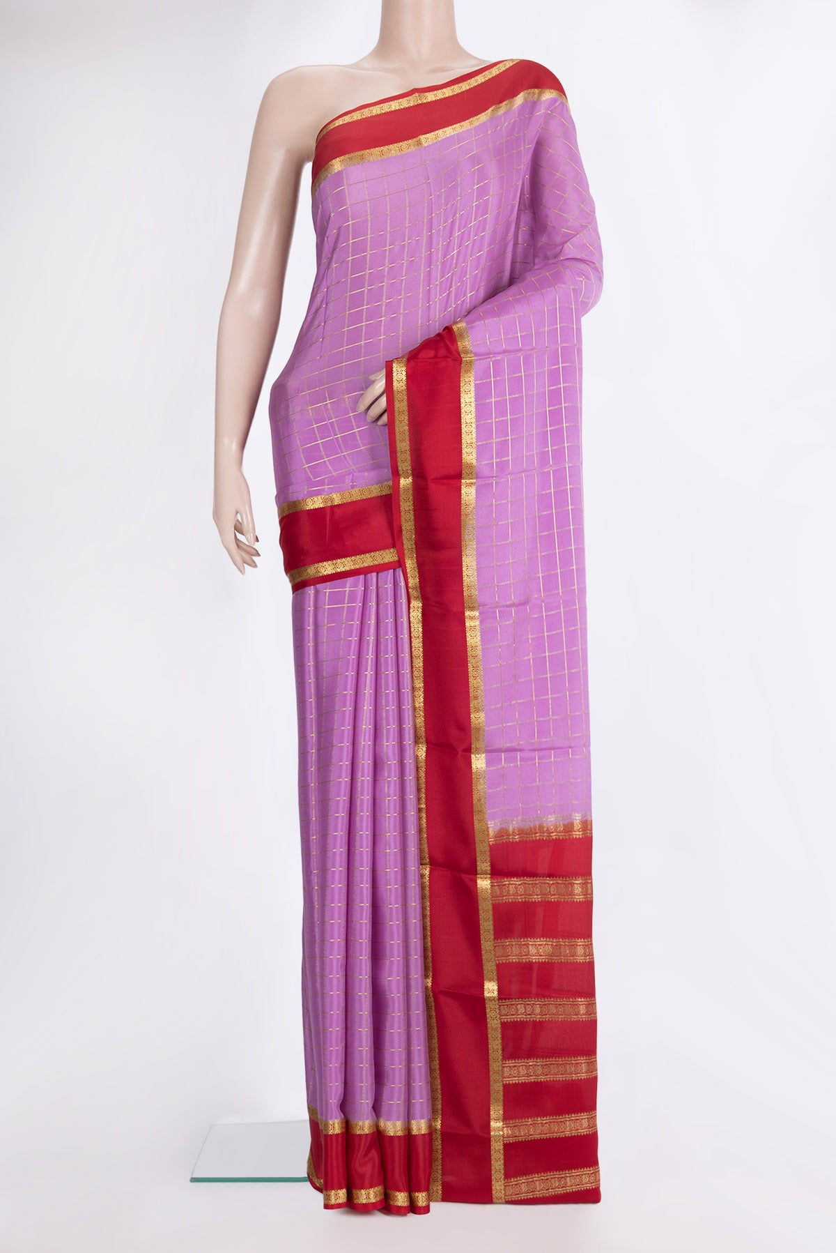 Lavender Mysore Crepe Saree with Checked design on the body and Zari Border.  displayed on a mannequin