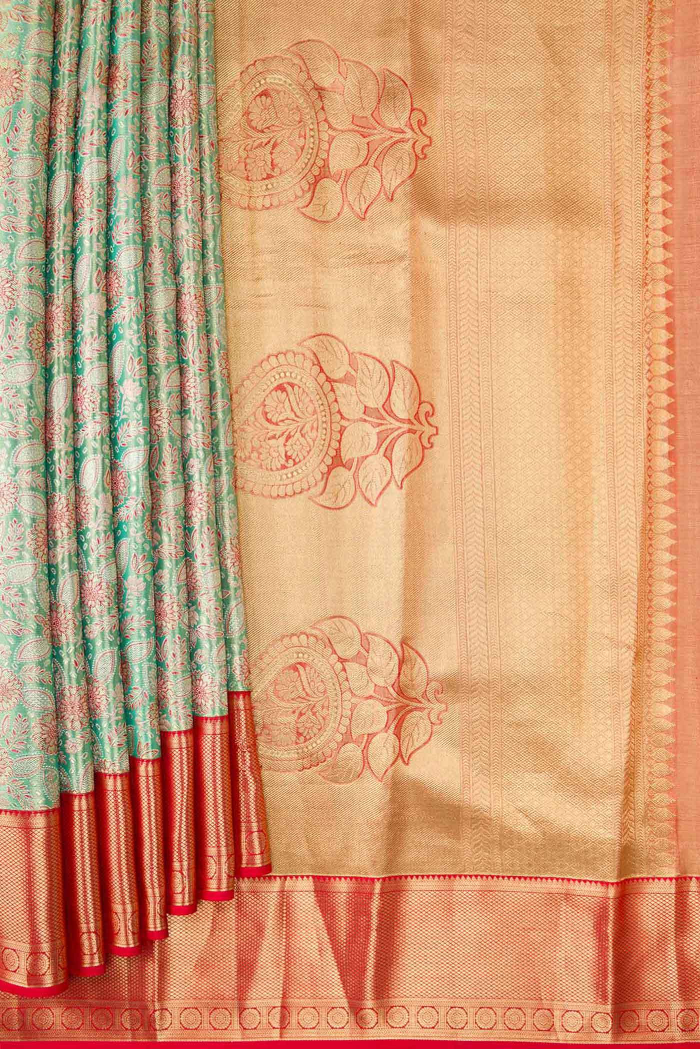 Pleats and pallu of Green Dual Tone Kanchipuram Tissue Silk Saree with Zari Brocade on the body and Zari Border. 