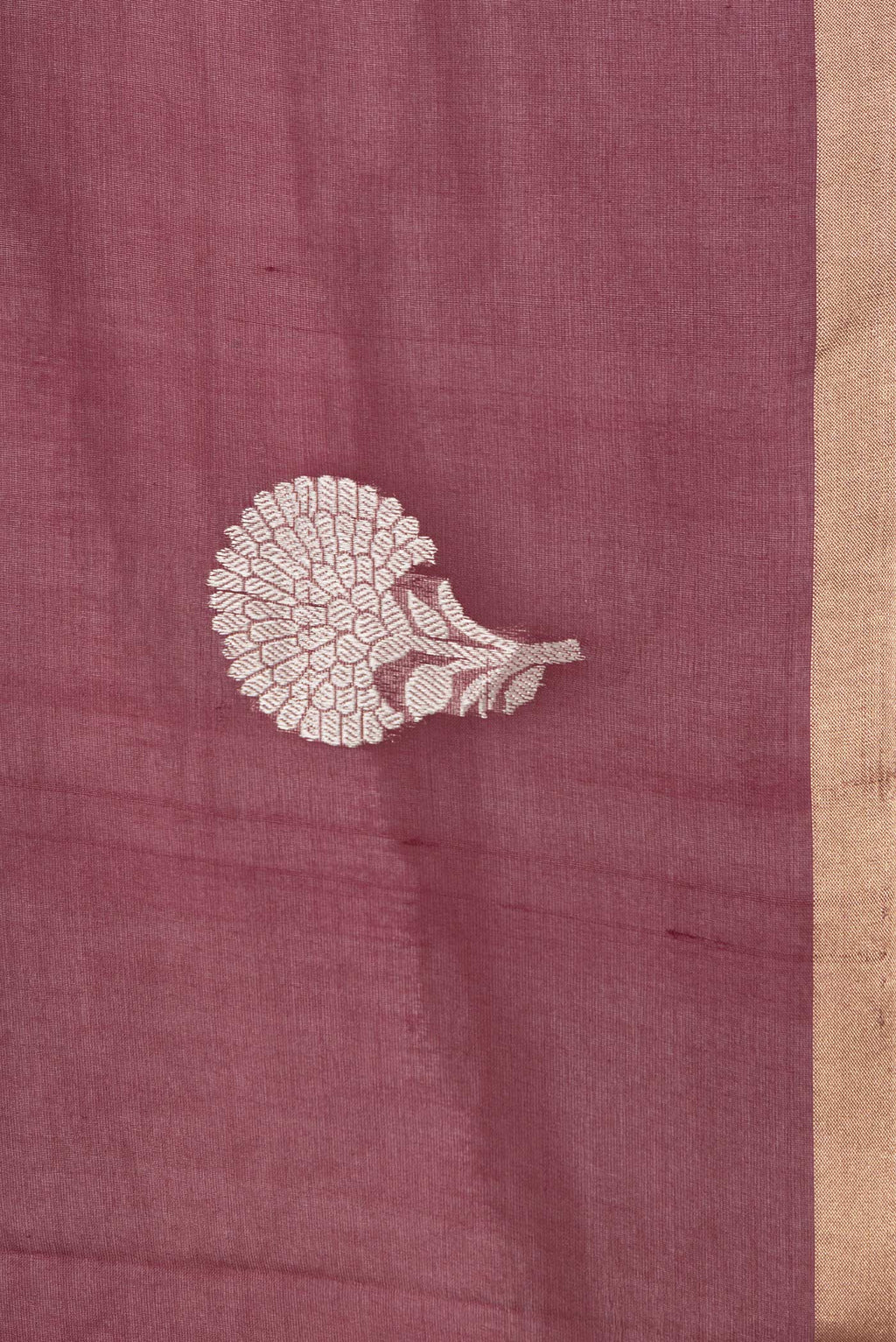 Border image of Maroon Dual Tone Organza Silk Saree with Zari Butta on the body and Thin Zari Line. 