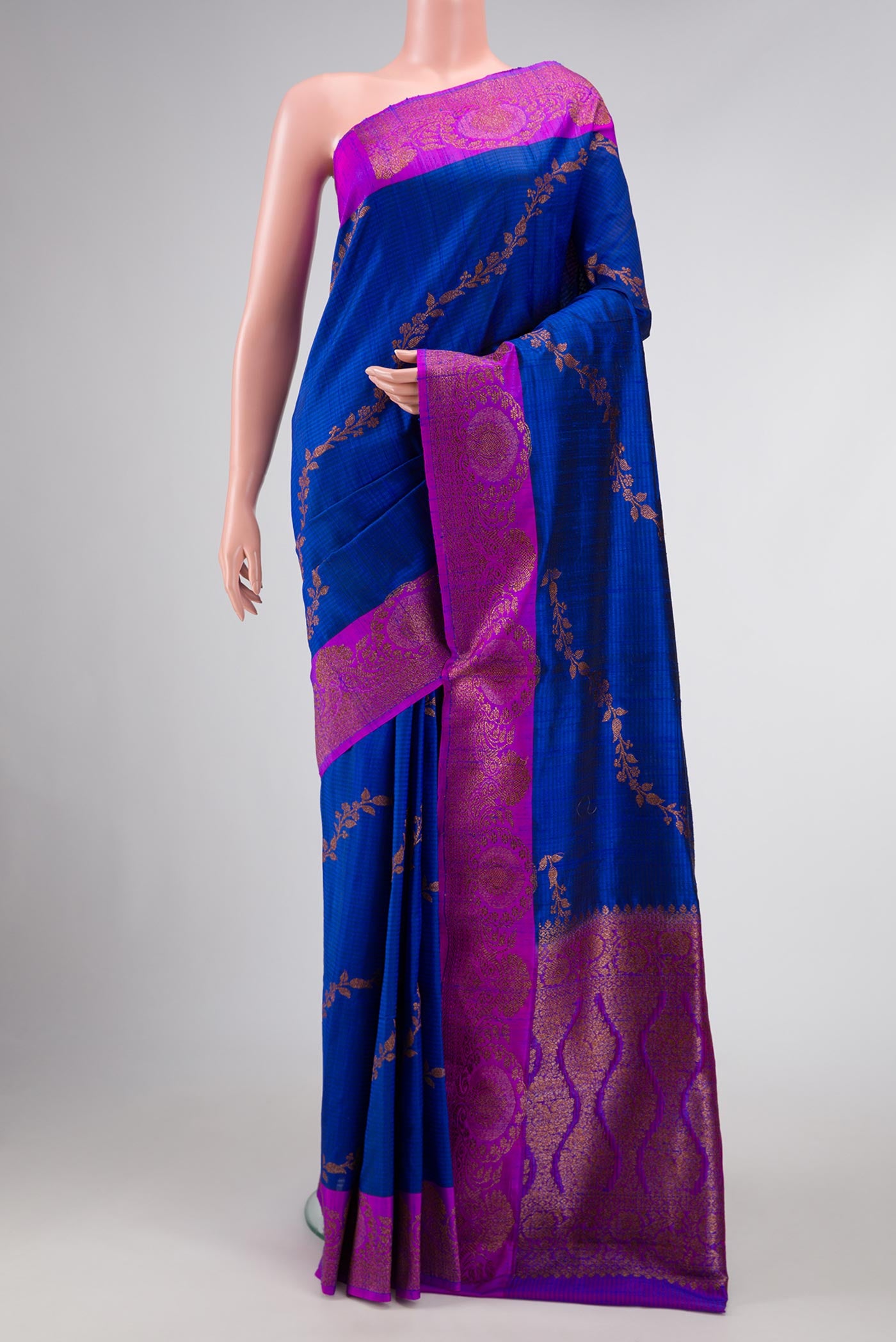Royal Blue Banarasi Tussar Silk Saree with Zari Butta on the body and Zari Border displayed on a mannequin