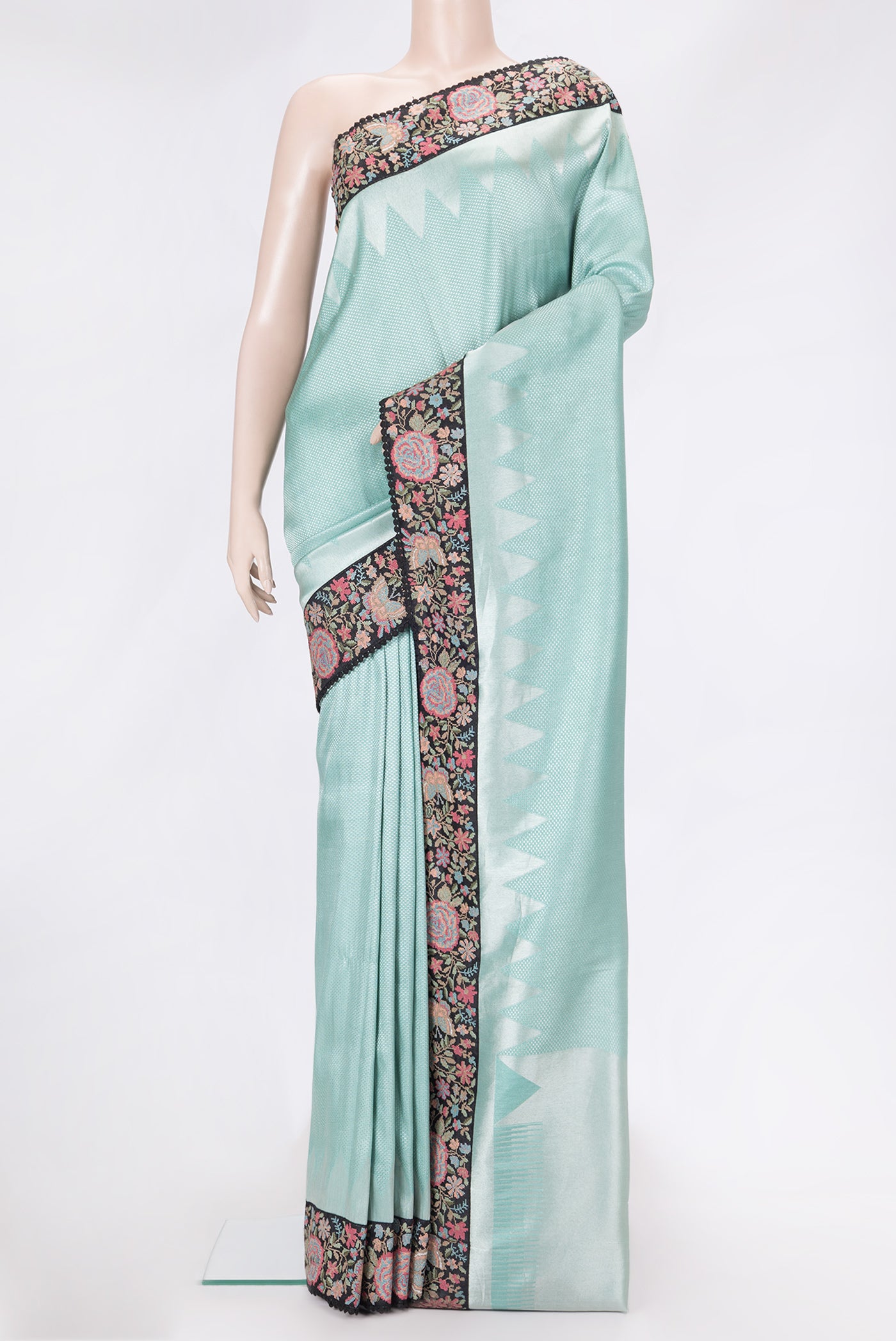 Sky Blue Dual Tone Banarasi Silk Saree with Zari Brocade on the body and Embroidery Border.  displayed on a mannequin