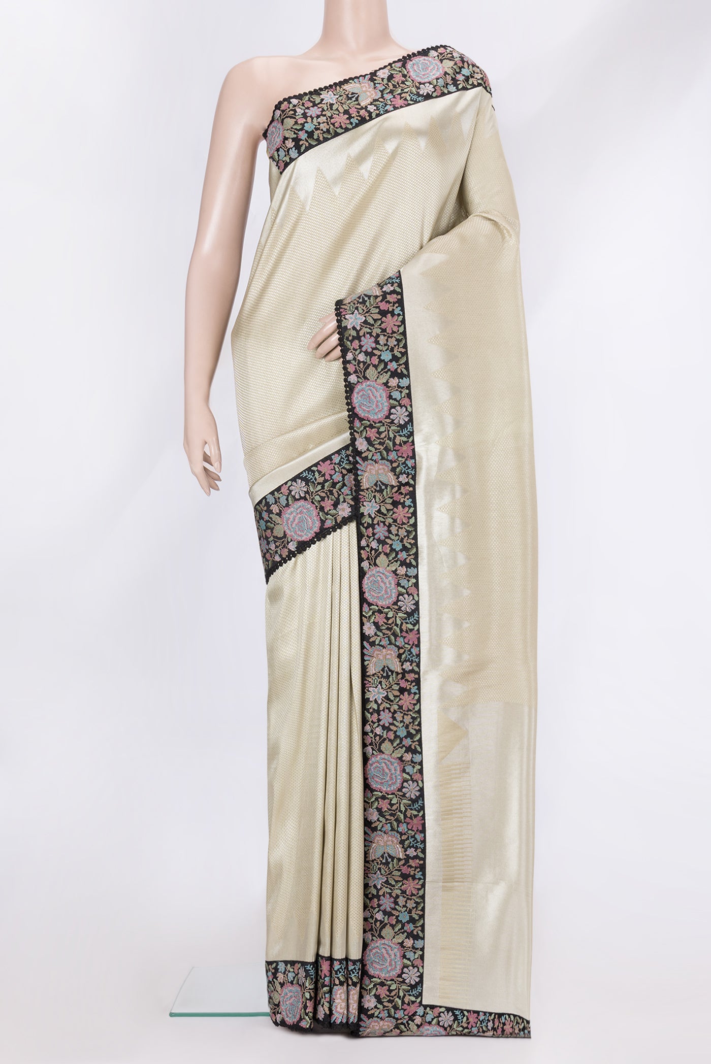 Beige Dual Tone Banarasi Silk Saree with Zari Brocade on the body and Embroidery Border.  displayed on a mannequin