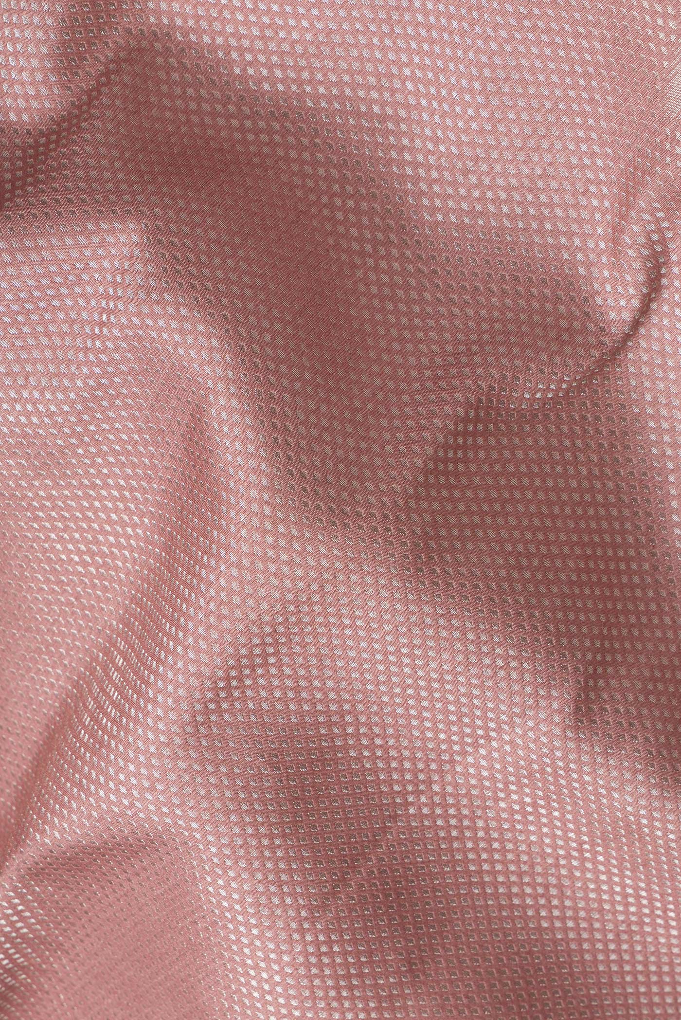 Close up of Pink Dual Tone Banarasi Silk Saree with Zari Brocade on the body and Embroidery Border.  displaying folds