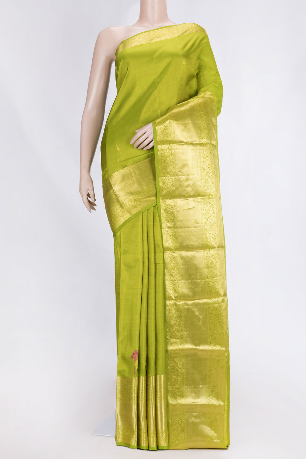 Parrot Green Dual Tone Kanjivaram Saree with Zari Butta on the body and Zari Border.  displayed on a mannequin