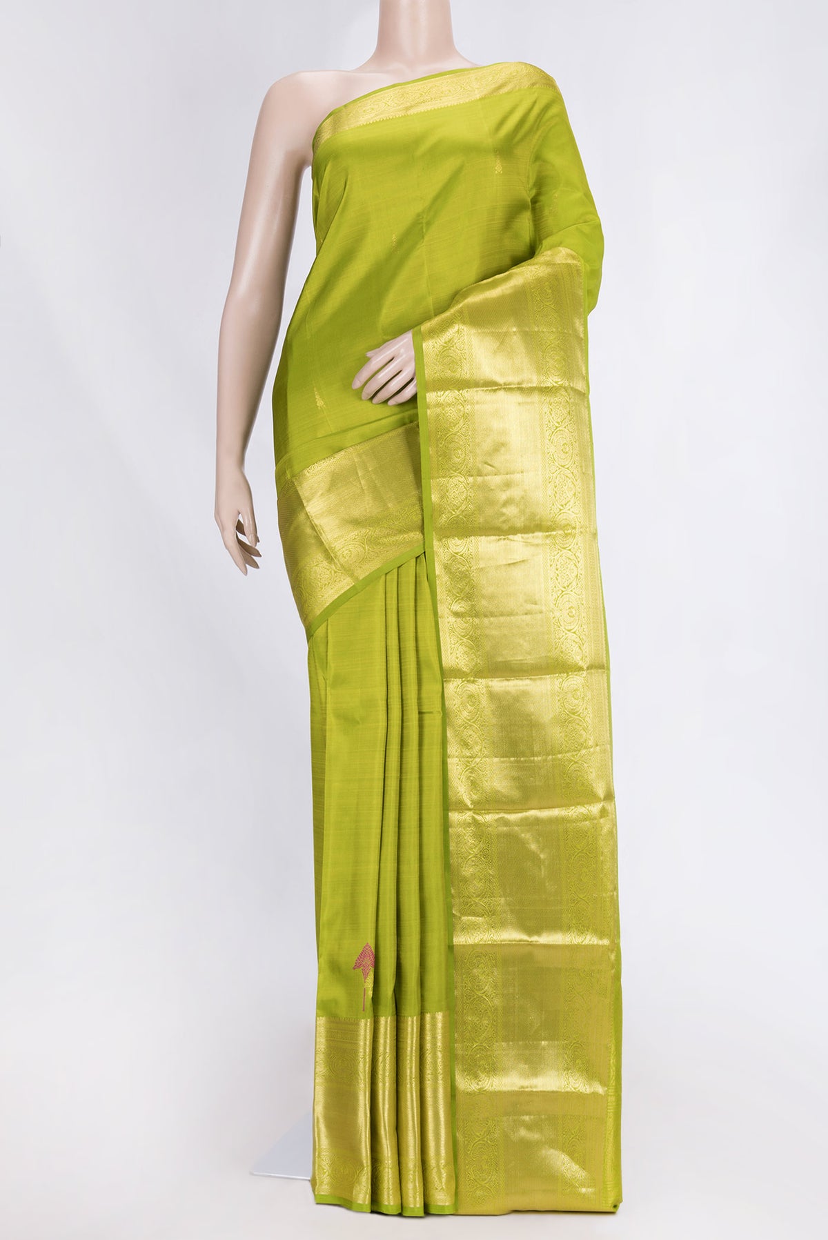 Parrot Green Dual Tone Kanjivaram Saree with Zari Butta on the body and Zari Border.  displayed on a mannequin