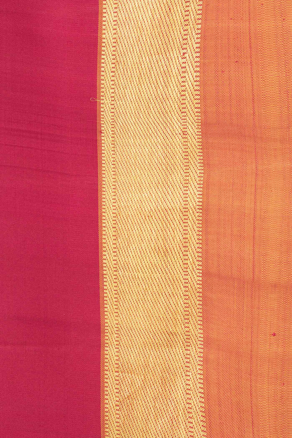 Border image of Maroon Dual Tone Kanjivaram Saree with Plain Body and Zari Border. 