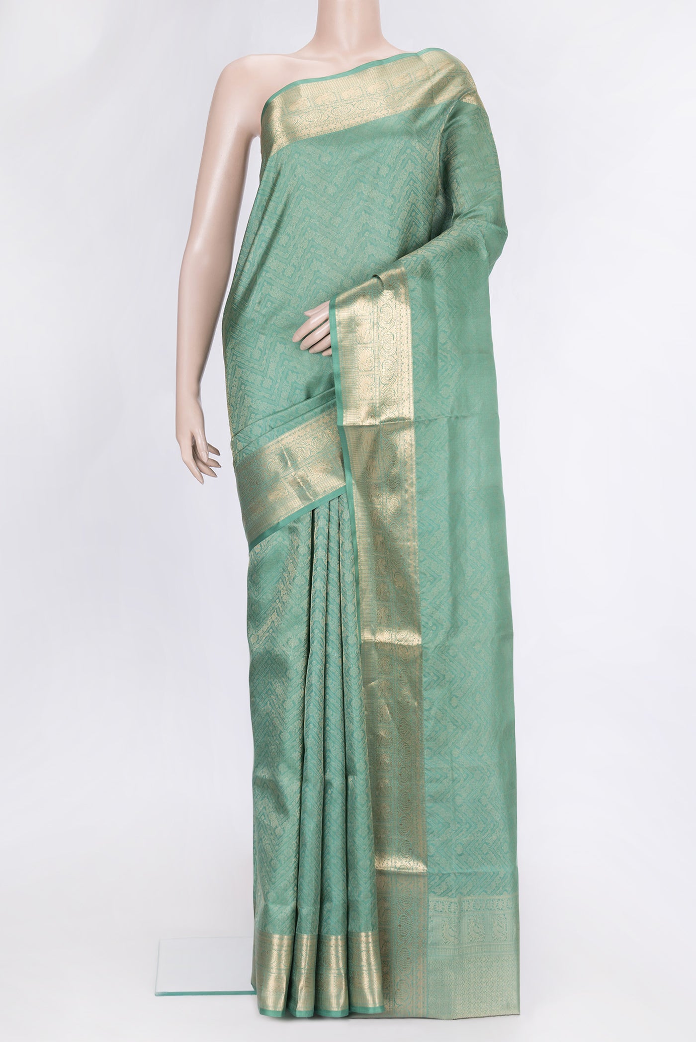 Sea Green Dual Tone Soft Silk Saree with Zari Brocade on the body and Zari Border.  displayed on a mannequin