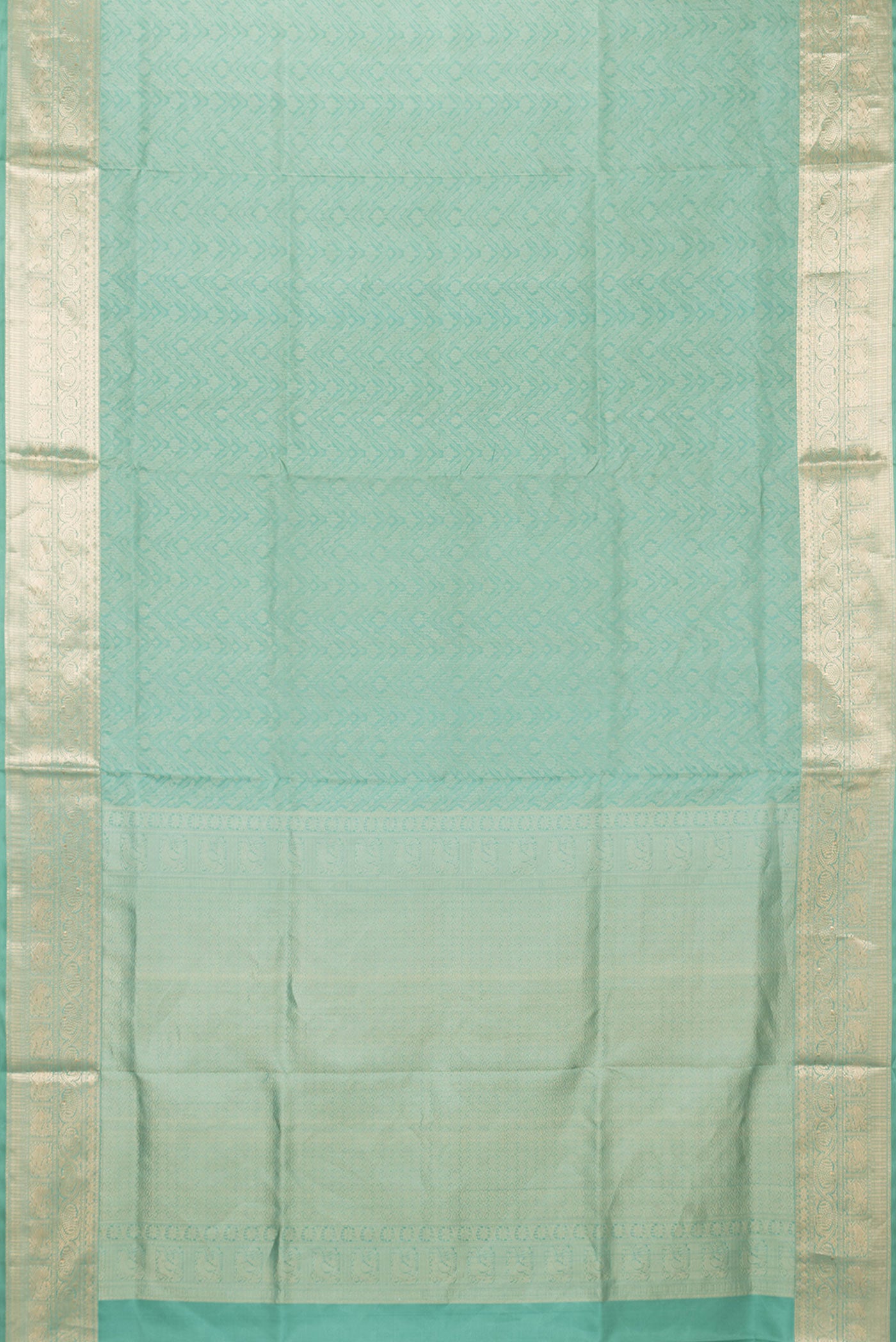 Flat view of Sea Green Dual Tone Soft Silk Saree with Zari Brocade on the body and Zari Border. 