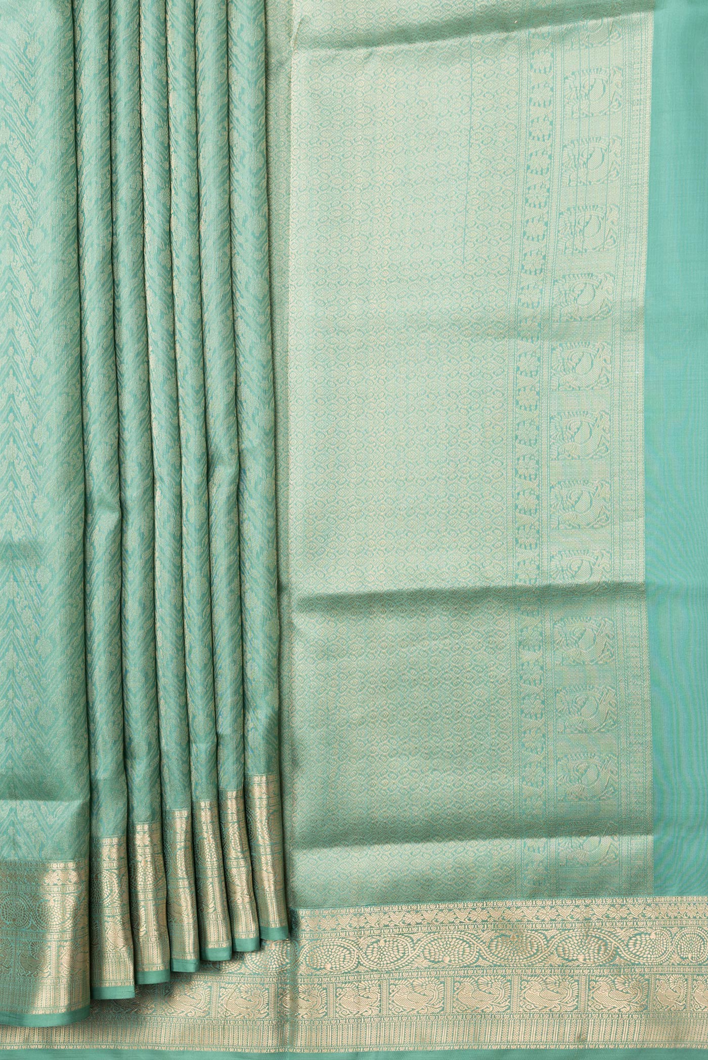 Pleats and pallu of Sea Green Dual Tone Soft Silk Saree with Zari Brocade on the body and Zari Border. 