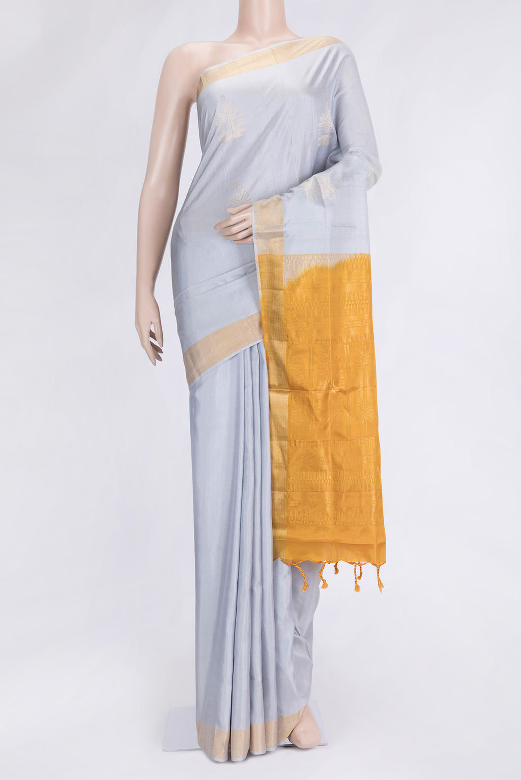 Grey Dual Tone Soft Silk Saree with Zari Butta on the body and Zari Border.  displayed on a mannequin