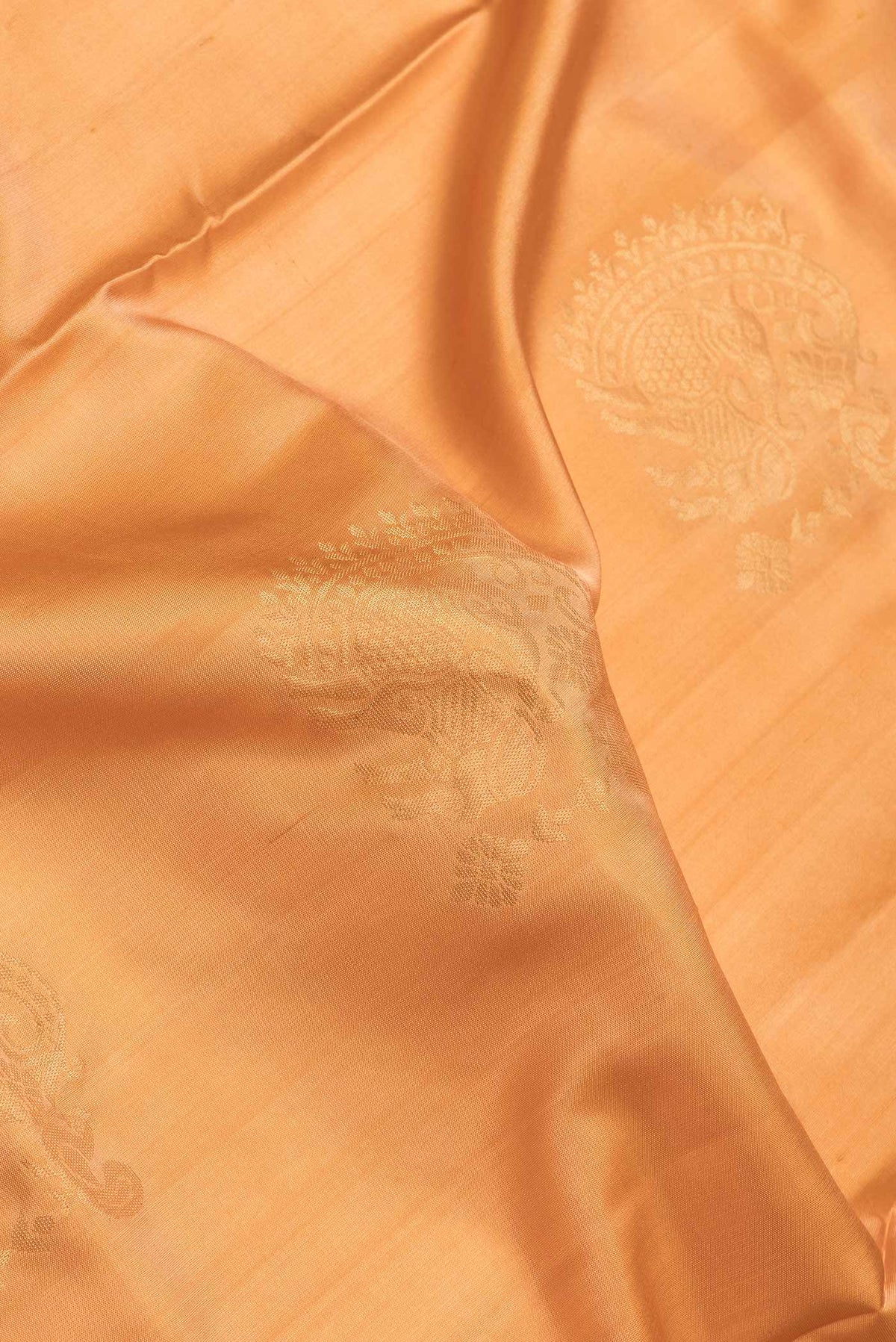 Close up of Sandal Dual Tone Soft Silk Saree with Zari Butta on the body and Zari Border.  displaying folds