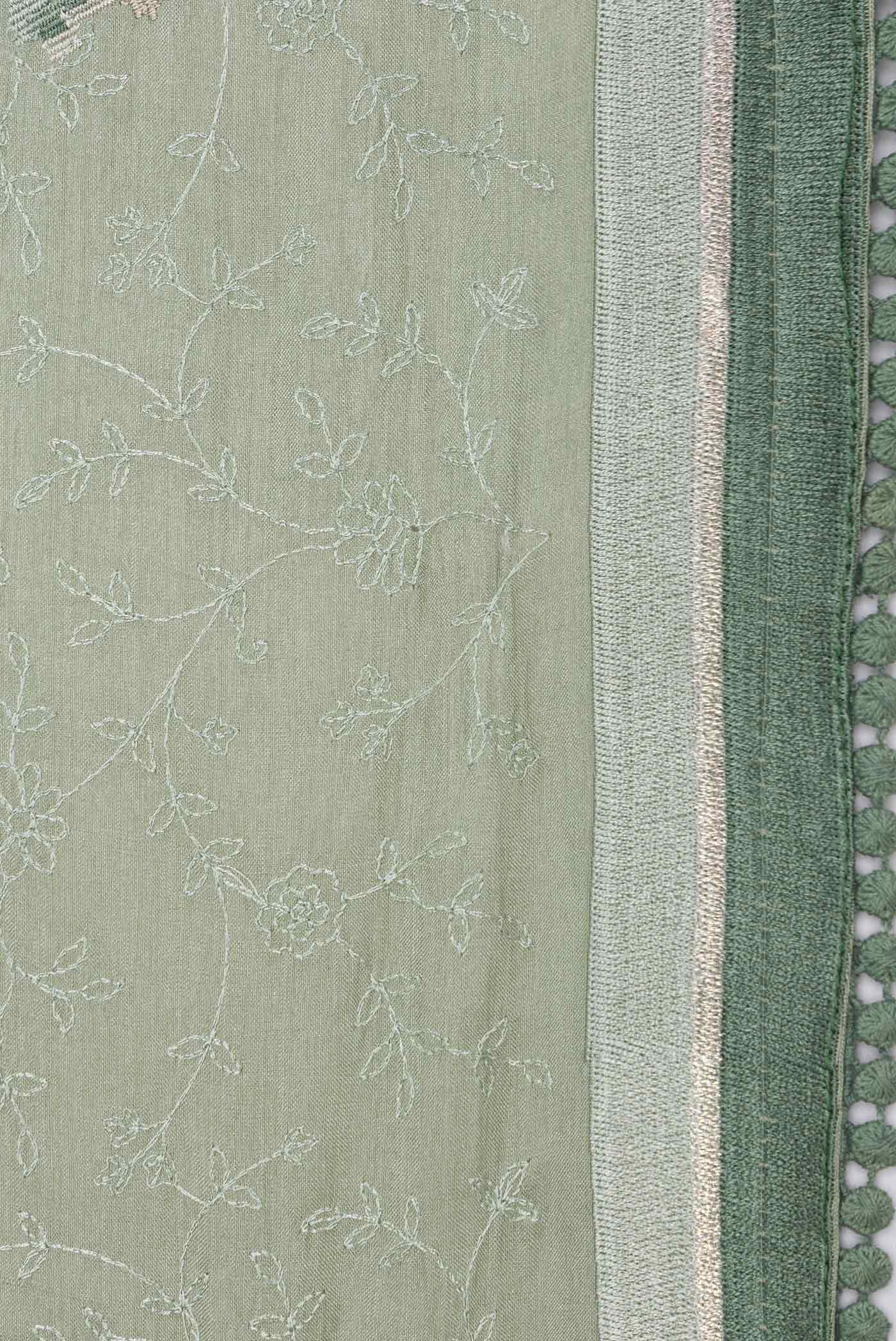 Border image of Green Dual Tone Tussar Saree with Embroidery on the body and Embroidery Border
