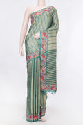 Green Dual Tone Tussar Silk Saree with Stripes on the body and Embroidery Border displayed on a mannequin