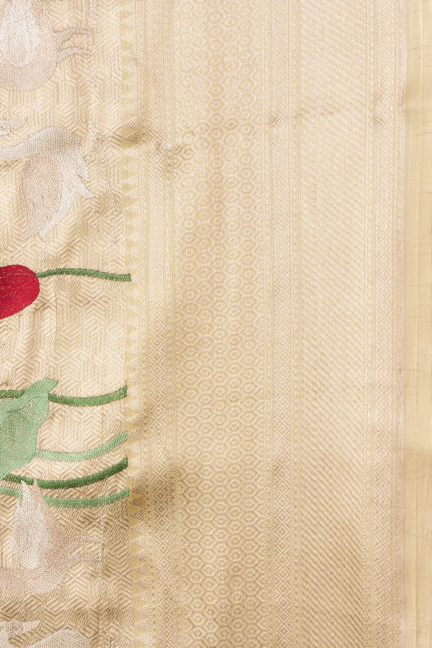 Border image of Gold Dual Tone Organza Silk Saree with Zari Brocade on the body and Fancy Border. 