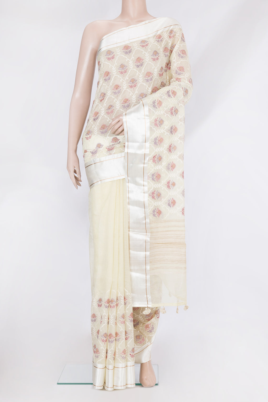 Off White Kota Silk Saree with Embroidery on the body and Satin Border.  displayed on a mannequin
