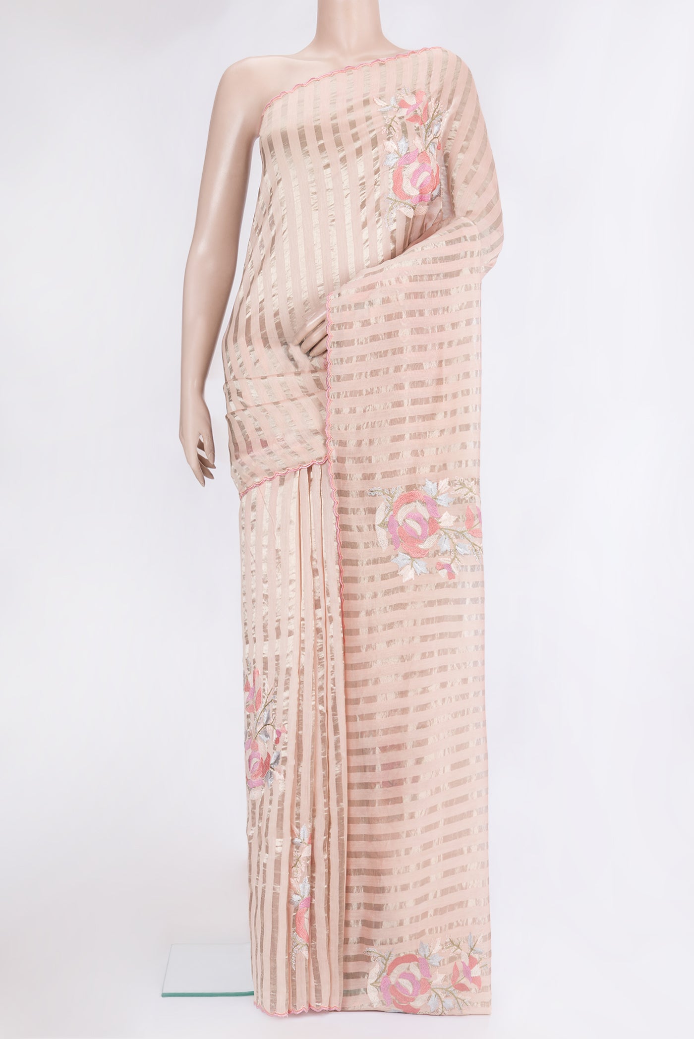 Rose pink Tussar Silk Saree with Stripes on the body and Embroidery Border.  displayed on a mannequin