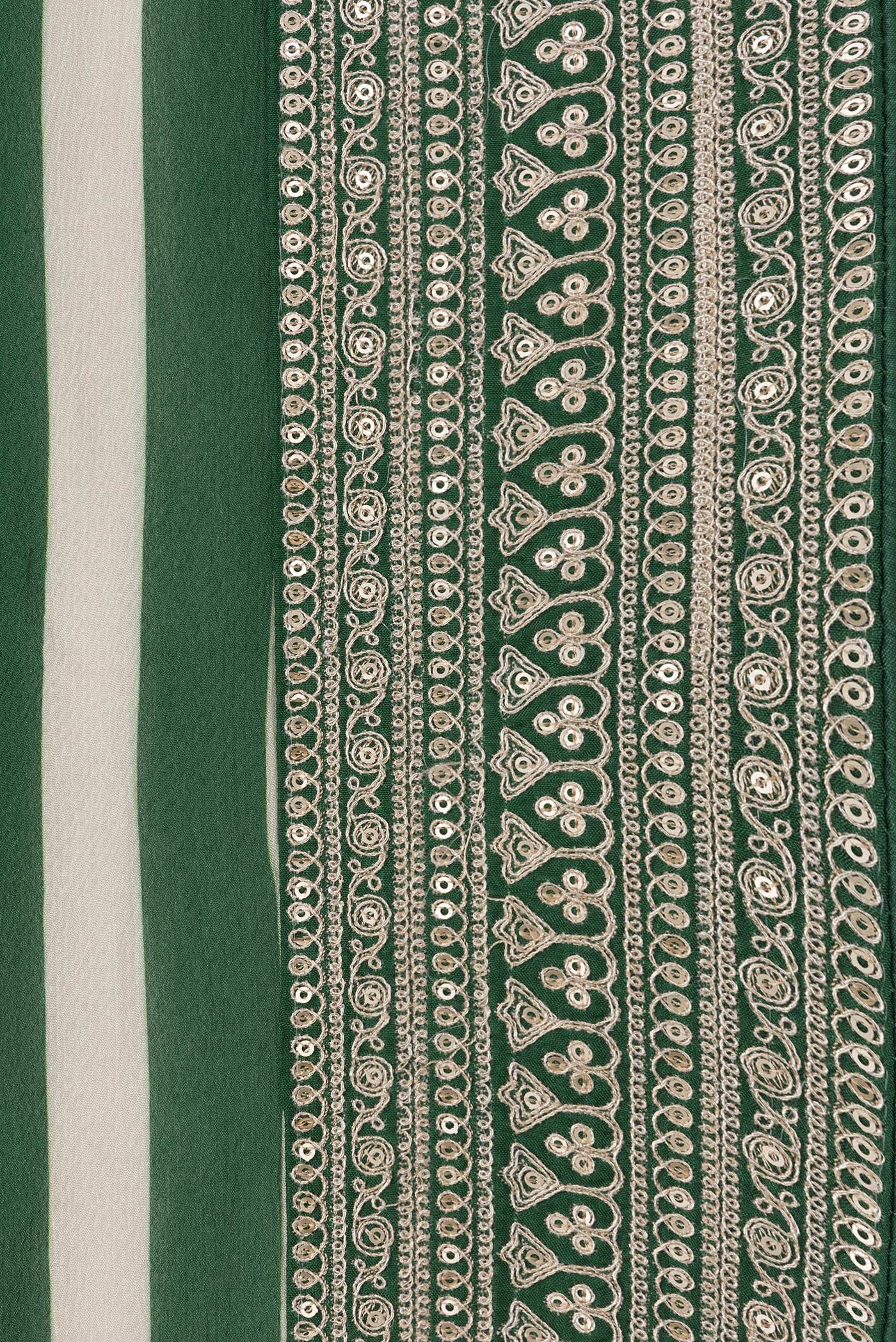 Border image of Off White and Green Color Mysore Crepe Saree with Printed design on the body and Embroidery Border. 