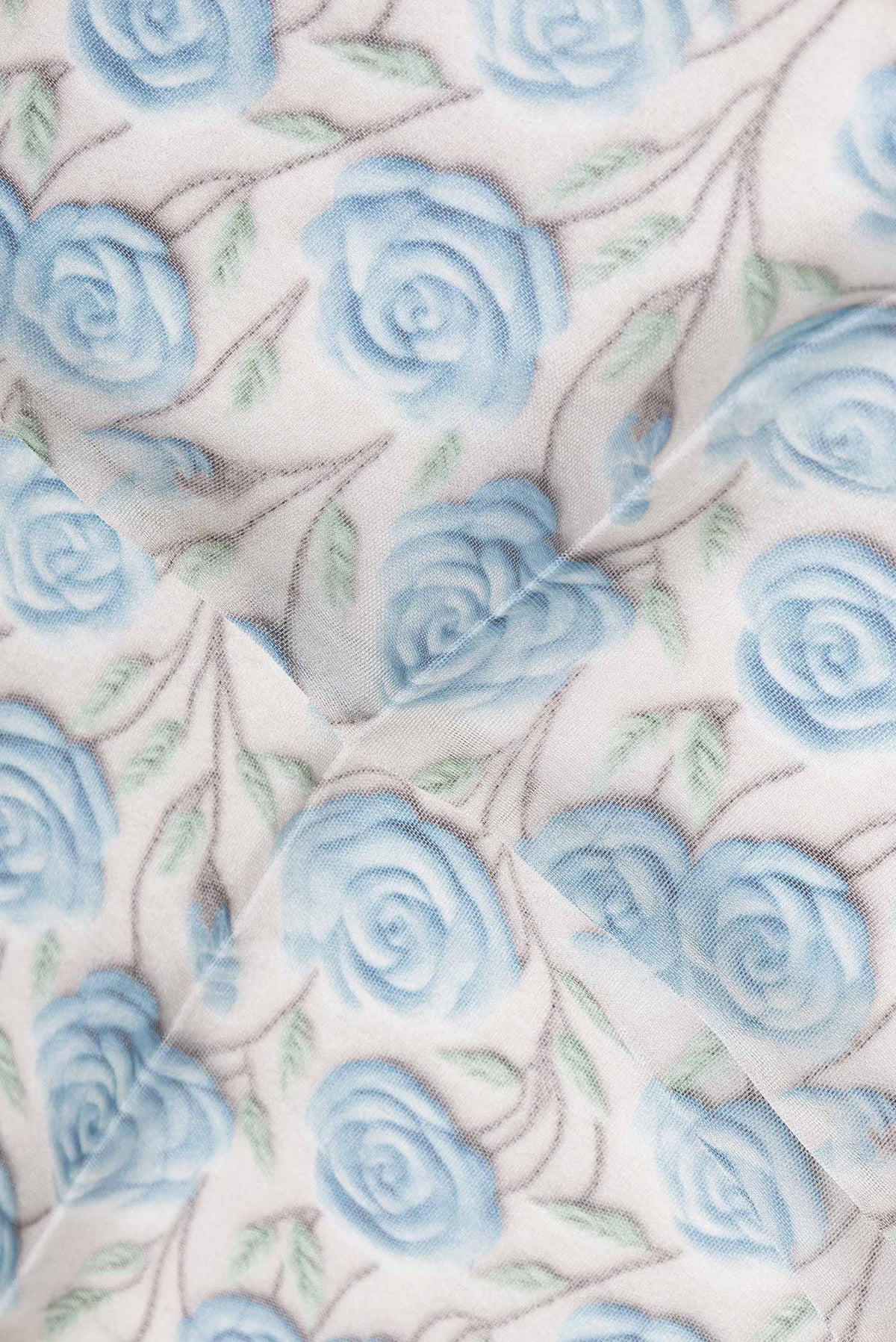 Close up of Grey Dual Tone Georgette SareePrinted design on the body and Embroidery Border displaying folds