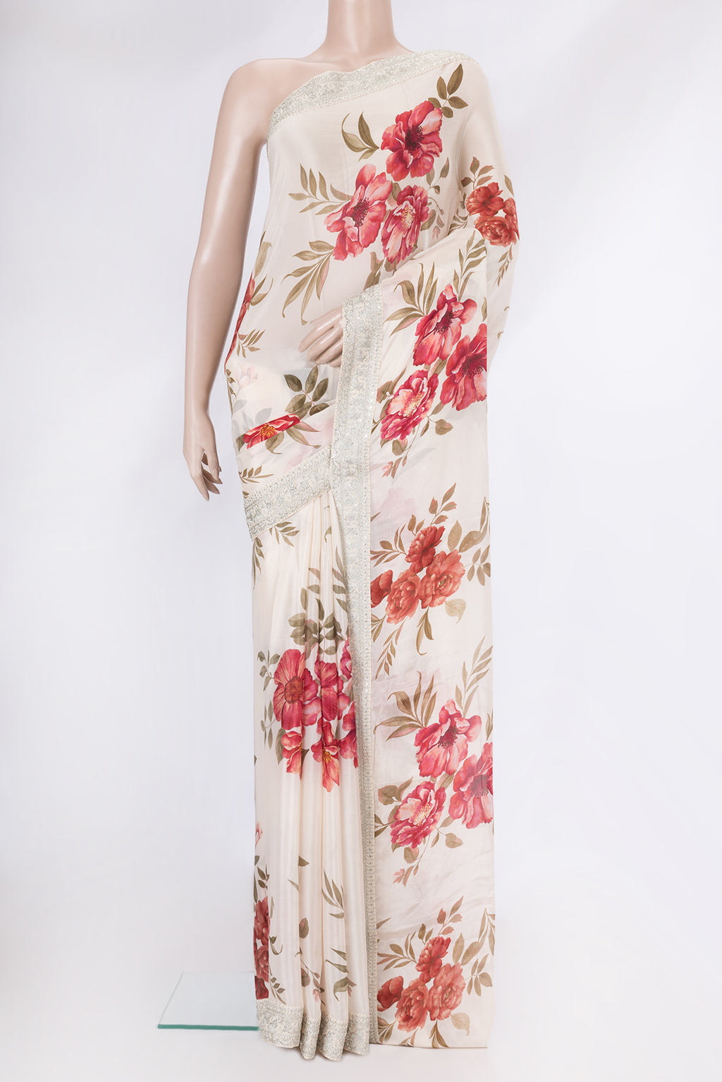 Golden Peach Dual Tone Georgette Saree with Printed design on the body and Embroidery Border.  displayed on a mannequin