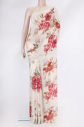 Golden Peach Dual Tone Georgette Saree with Printed design on the body and Embroidery Border.  displayed on a mannequin
