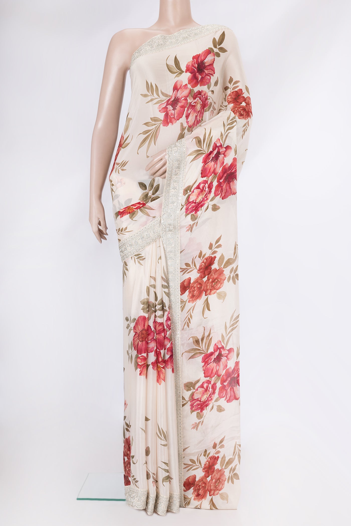 Golden Peach Dual Tone Georgette Saree with Printed design on the body and Embroidery Border.  displayed on a mannequin