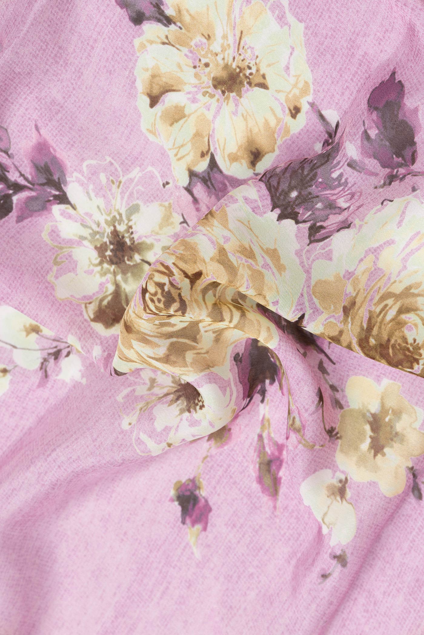 Close up of Pink Dual Tone Mysore Georgette Saree with Printed design on the body and Embroidery Border.  displaying folds
