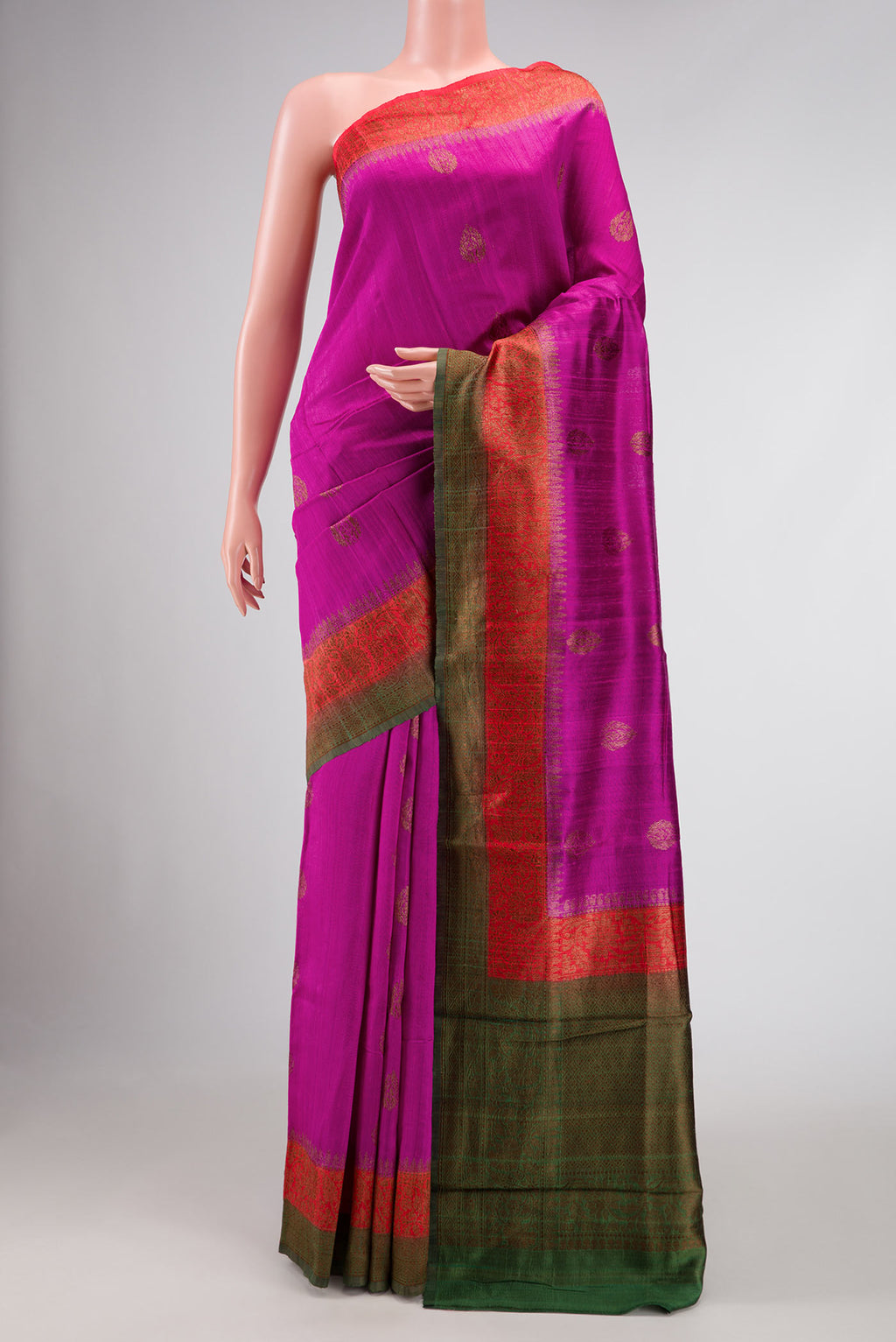 Magenta Dual Tone Raw Silk Saree with Zari Butta on the body and Zari Border displayed on a mannequin