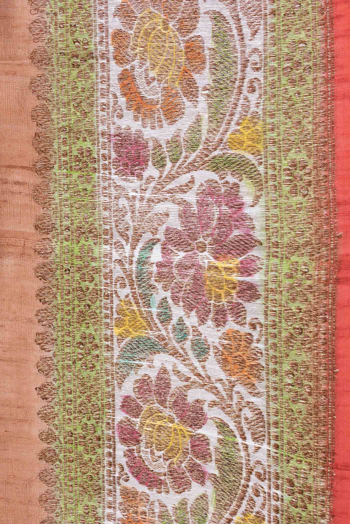 Border image of Brown Dual Tone Tussar Saree with Zari Butta on the body and Zari And Thread Border. 