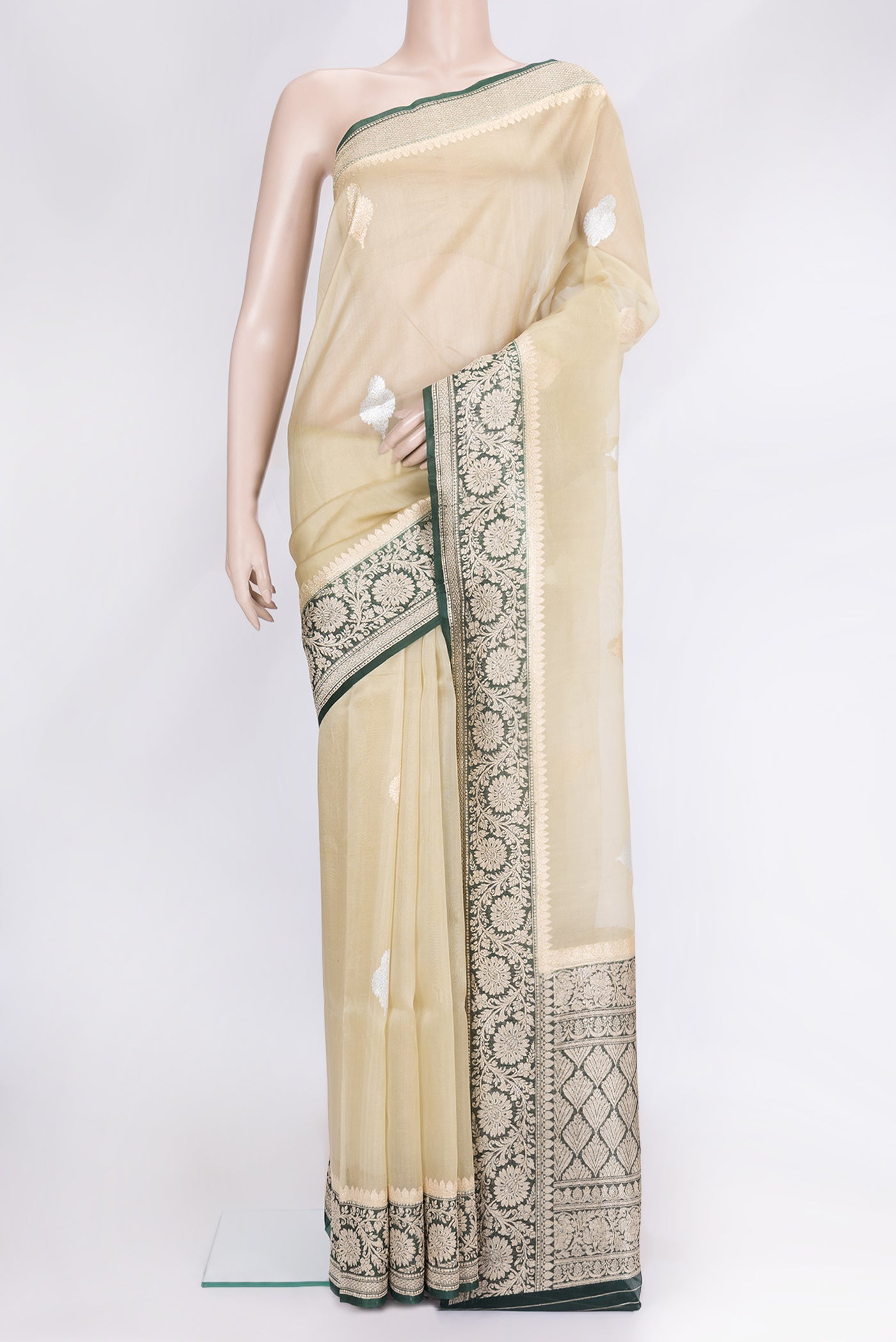 Sandal Dual Tone Organza Silk Saree with Zari Butta on the body and Zari Border.  displayed on a mannequin
