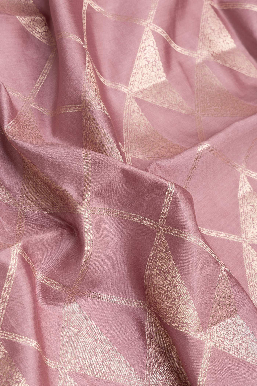 Close up of Purple Dual Tone Tussar Silk Saree with Zari Brocade on the body and Zari Border.  displaying folds