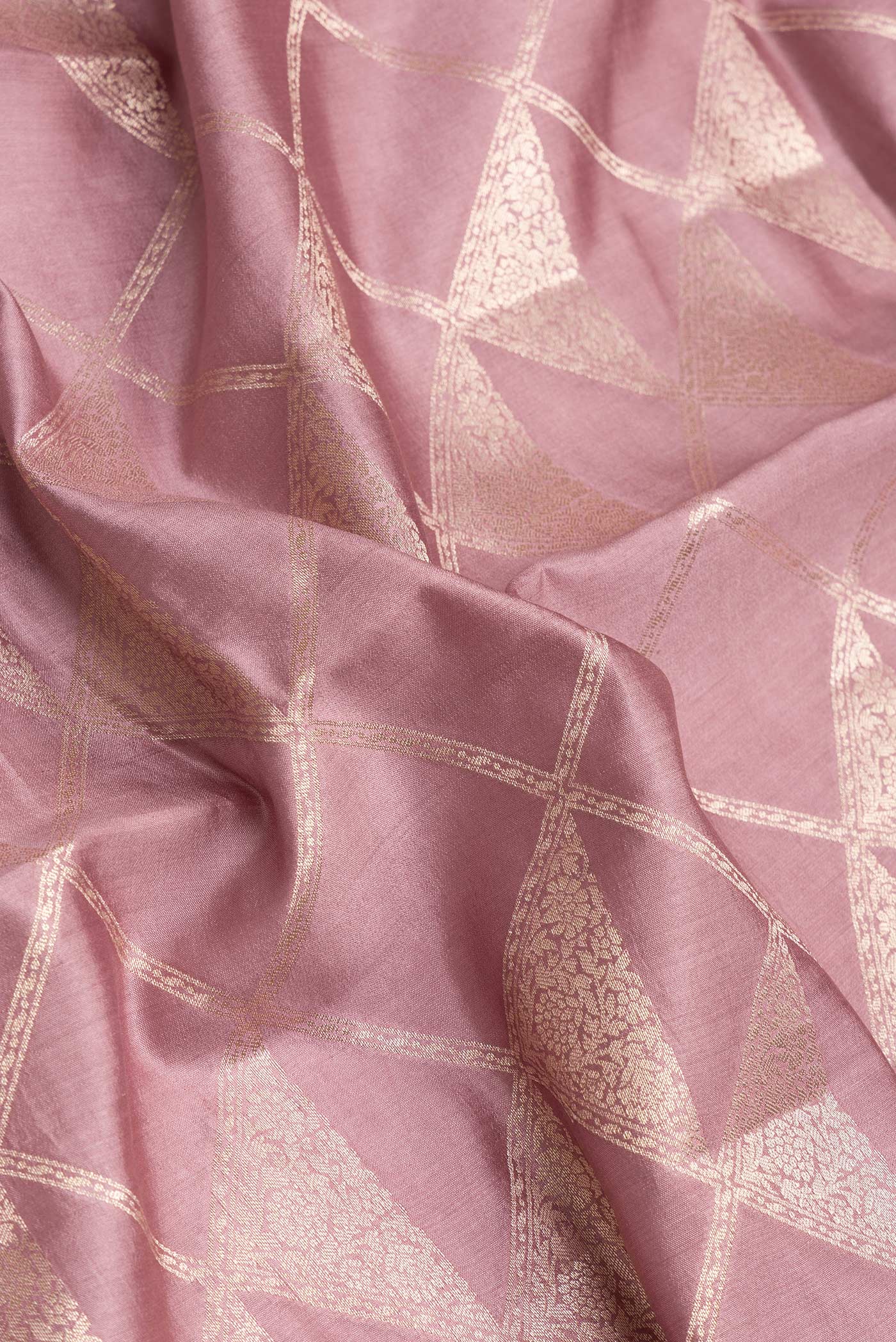 Close up of Purple Dual Tone Tussar Silk Saree with Zari Brocade on the body and Zari Border.  displaying folds