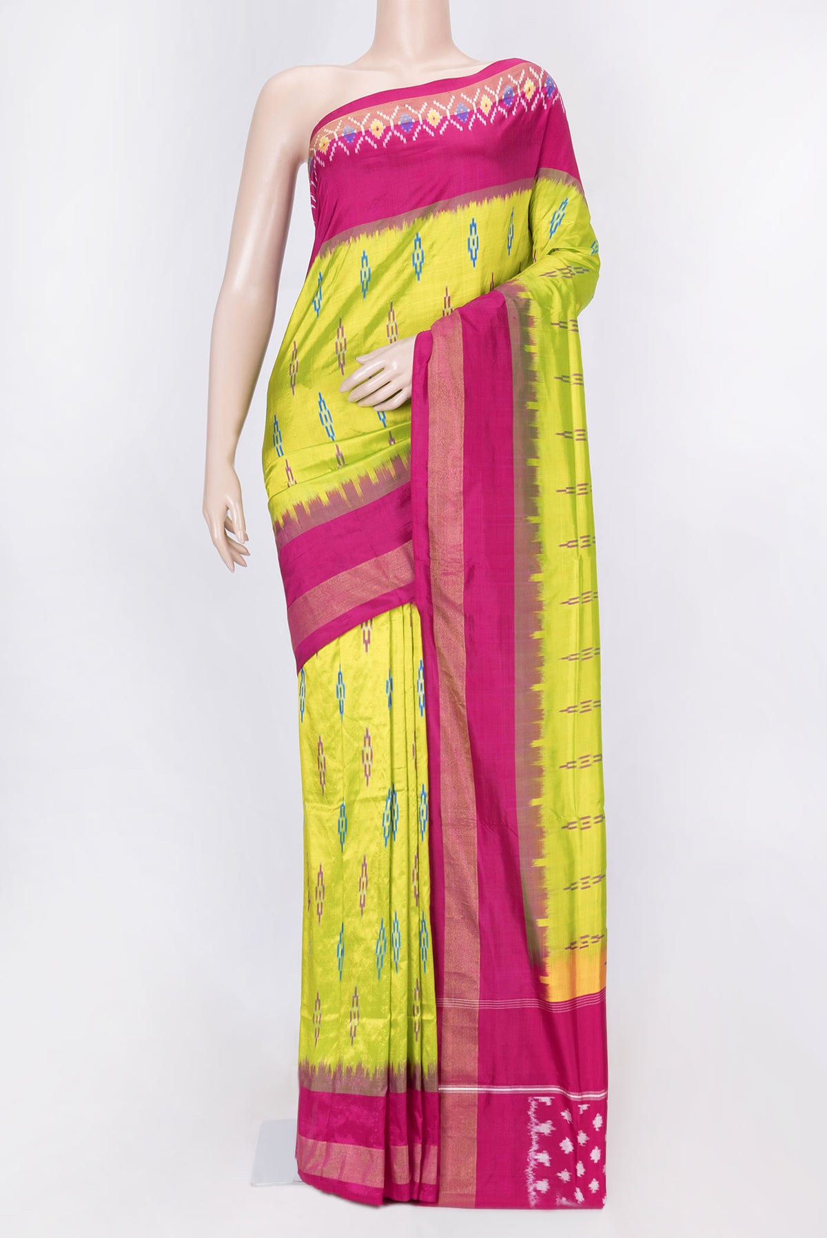 Parrot Green Dual Tone Double Ikat Saree with Ikat Print on the body and Zari Border displayed on a mannequin