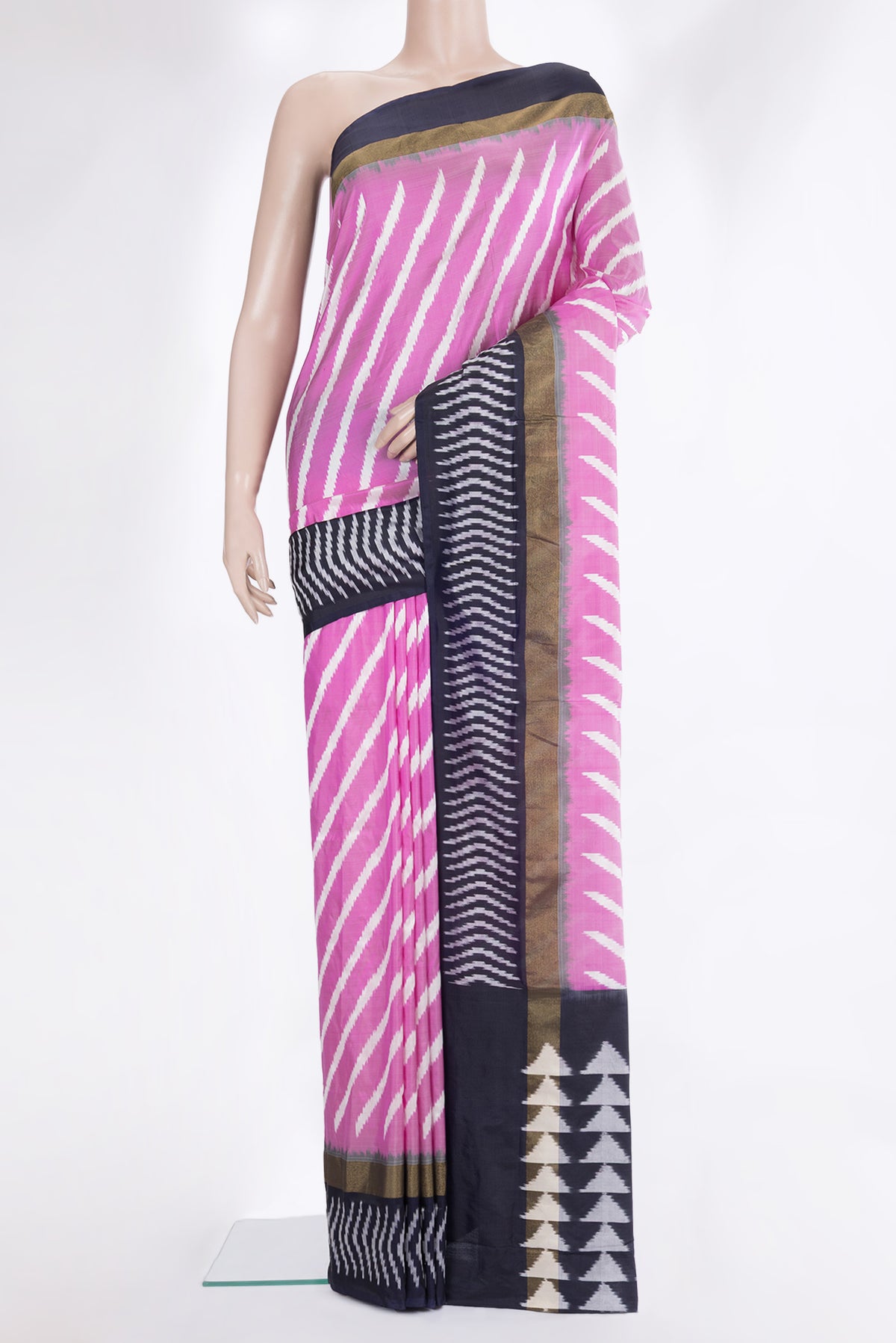 Pure Silk Pink Pochampally Saree with Ikat design on the body and Ikat Border.  displayed on a mannequin