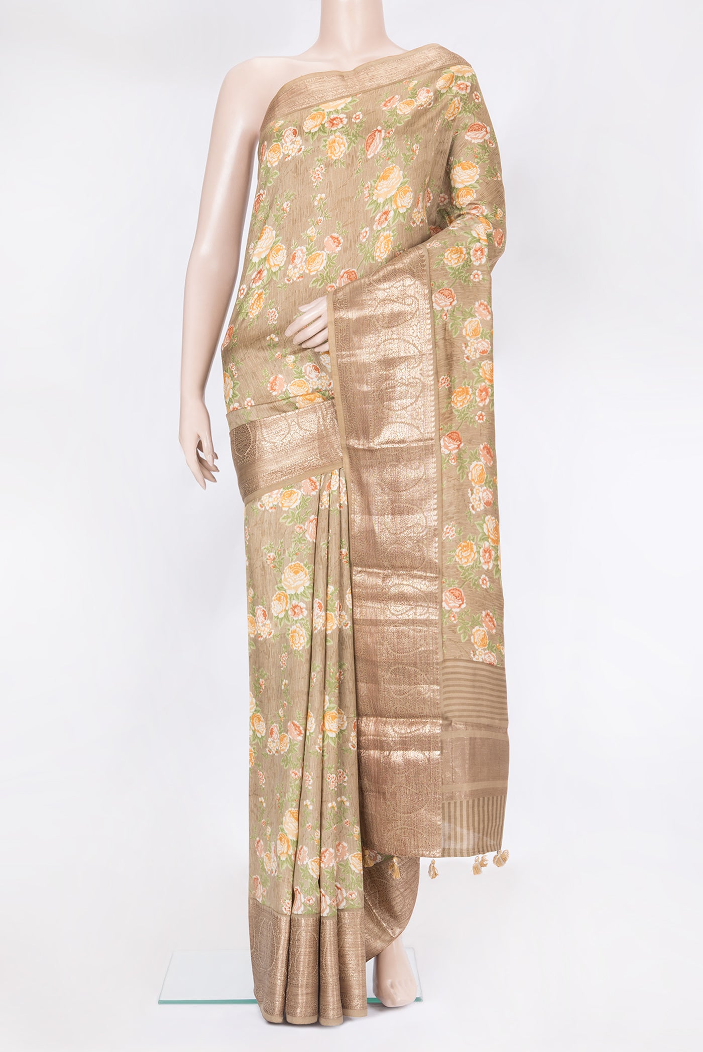 Dark Beige Chanderi Silk Saree with Printed design on the body and Fancy Border.  displayed on a mannequin