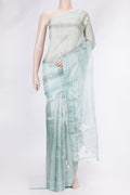 Light Green Dual Tone Organza Silk Saree with Embroidery on the body and Embroidery Border.  displayed on a mannequin