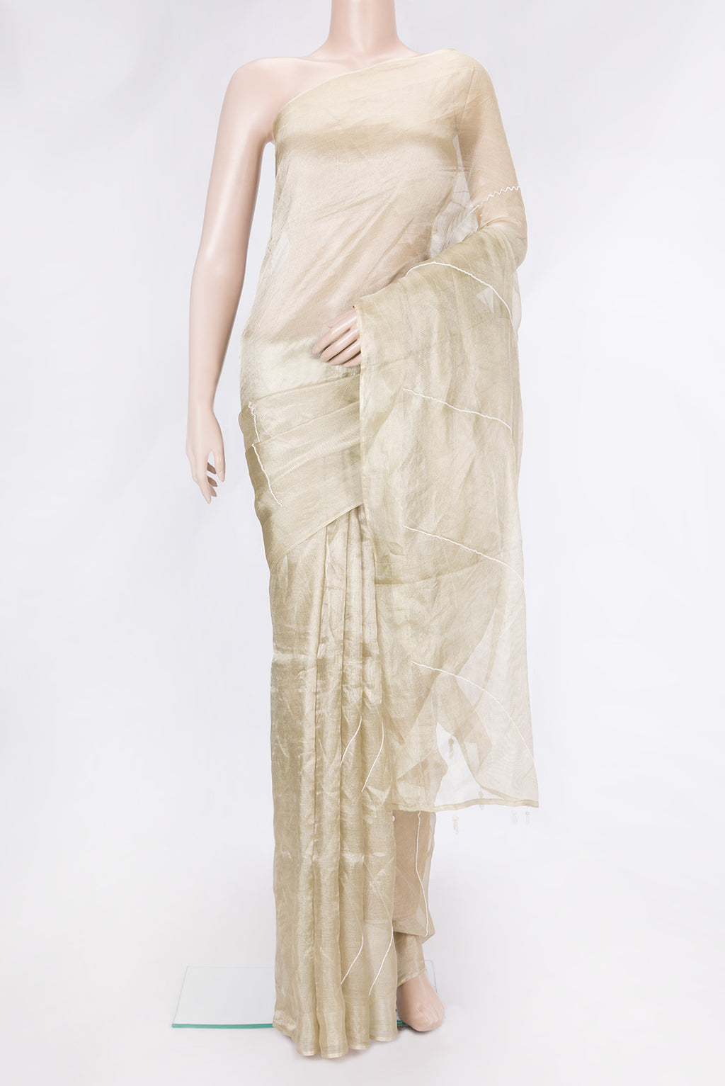 Beige Dual Tone Organza Silk Saree with Embroidery on the body and Without Border.  displayed on a mannequin
