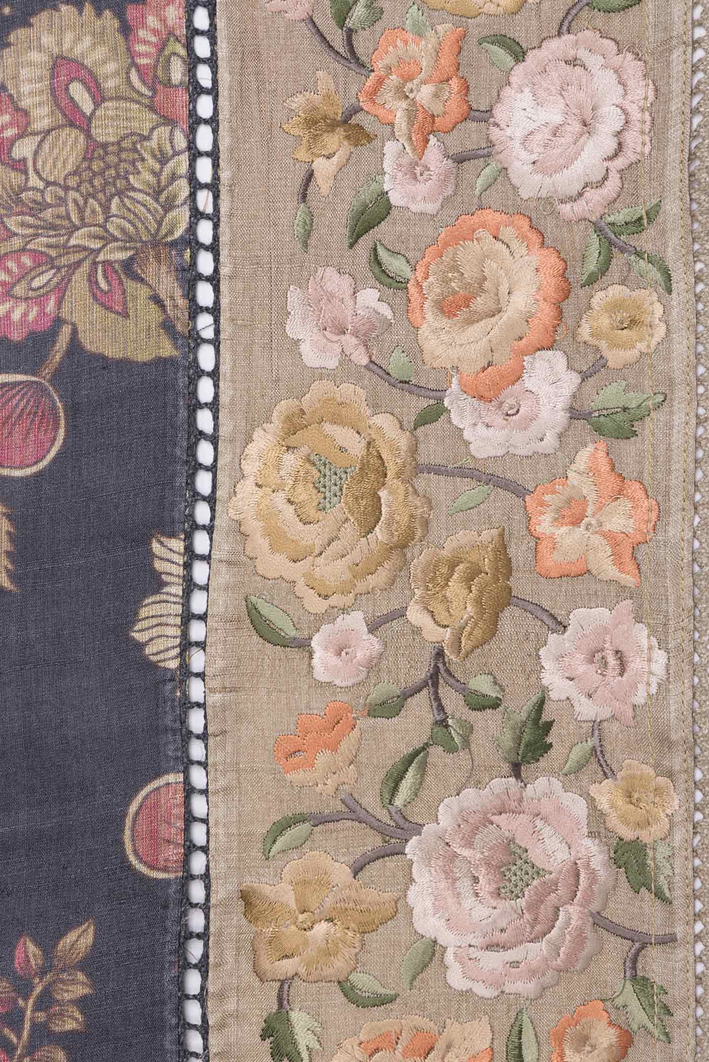 Border image of Black Dual Tone Tussar Saree with Printed design on the body and Embroidery Border