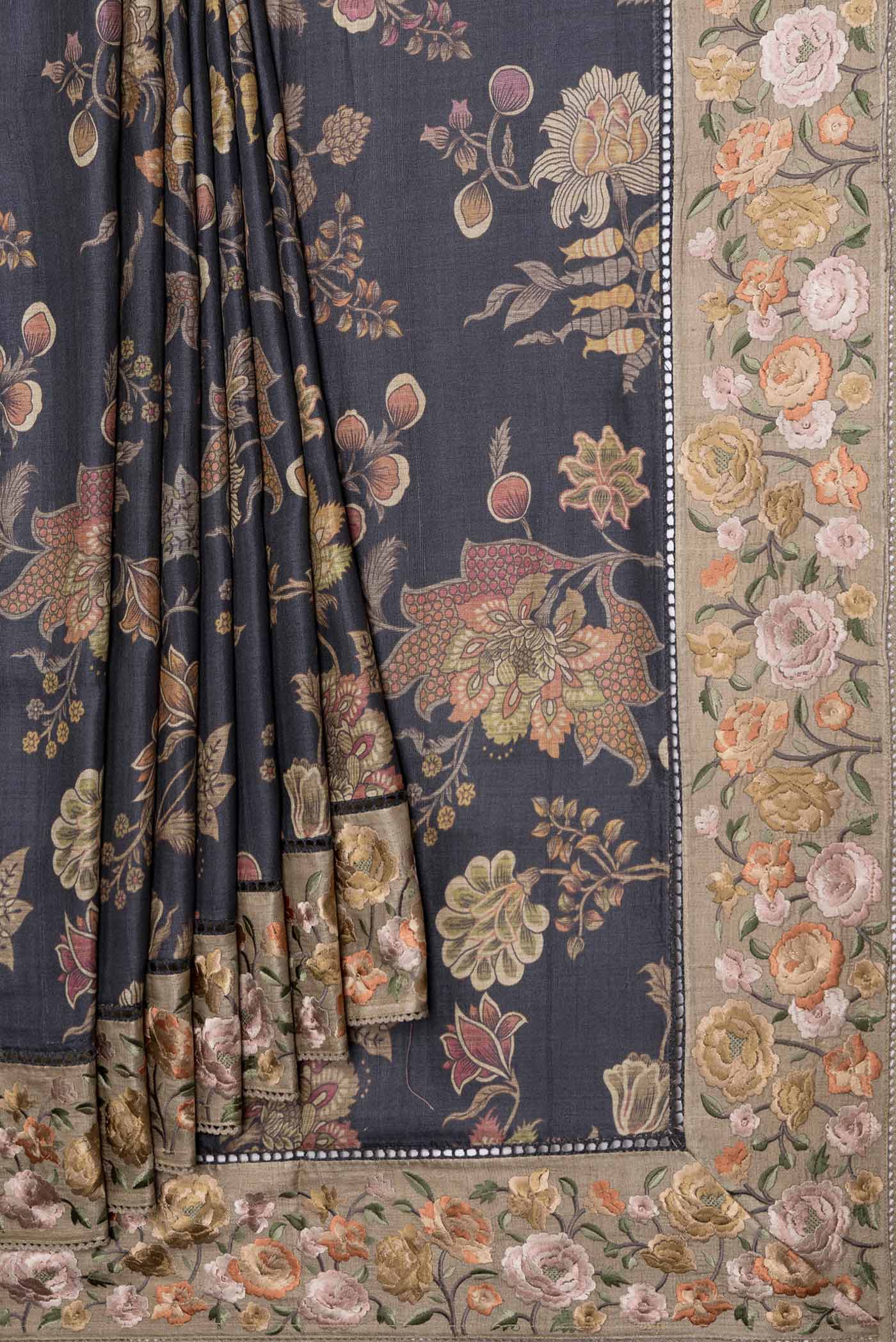 Pleats and pallu of Black Dual Tone Tussar Saree with Printed design on the body and Embroidery Border