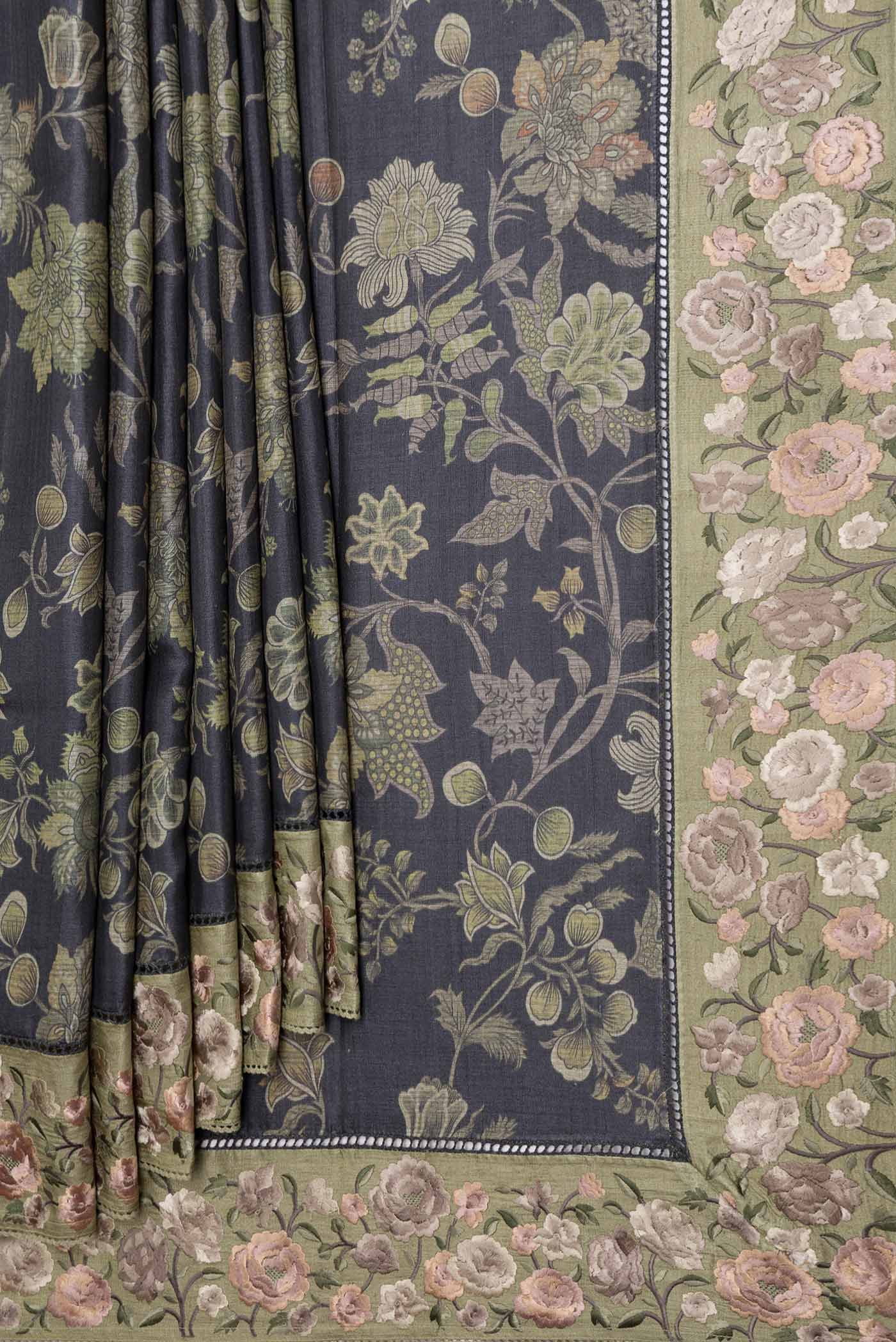 Pleats and pallu of Black Dual Tone Tussar Saree with Printed design on the body and Embroidery Border
